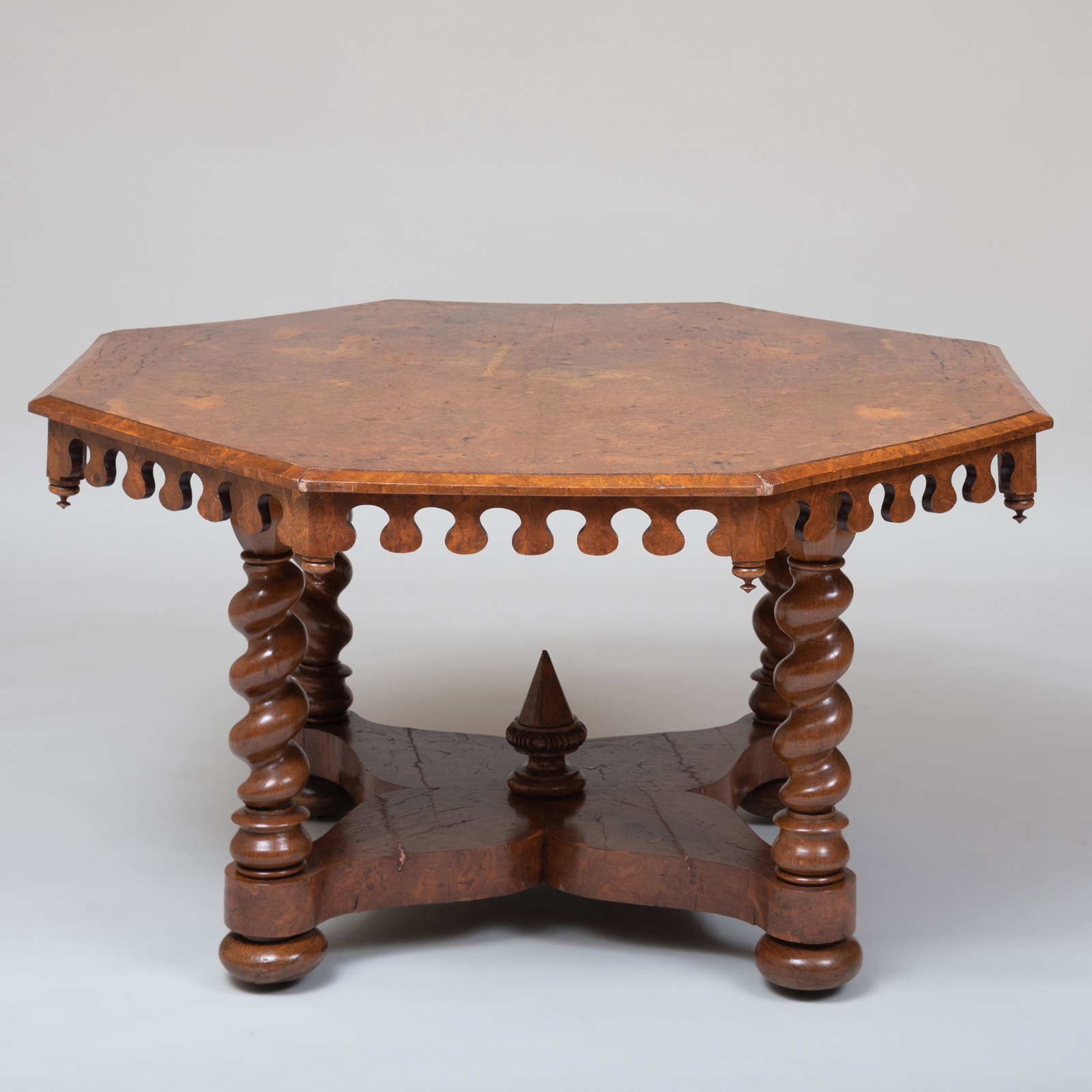 German Baroque Style Burlwood and Oak Center Table: German Baroque Style Burlwood and Oak Center Table Raised on casters. 28 1/4 x 4 ft. 1 in. x 4 ft. 1 in.