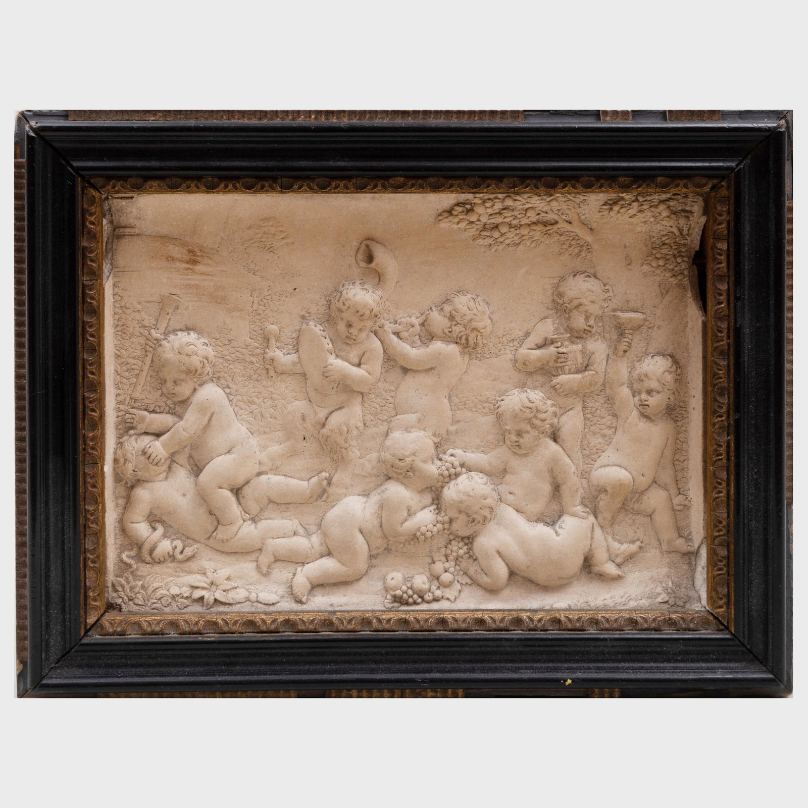 French Terracotta Relief Panel of a Putti Bacchanal: French Terracotta Relief Panel of a Putti Bacchanal Frame: 6 x 7 1/2 in. Property From the Estate of Thomas A. Cox