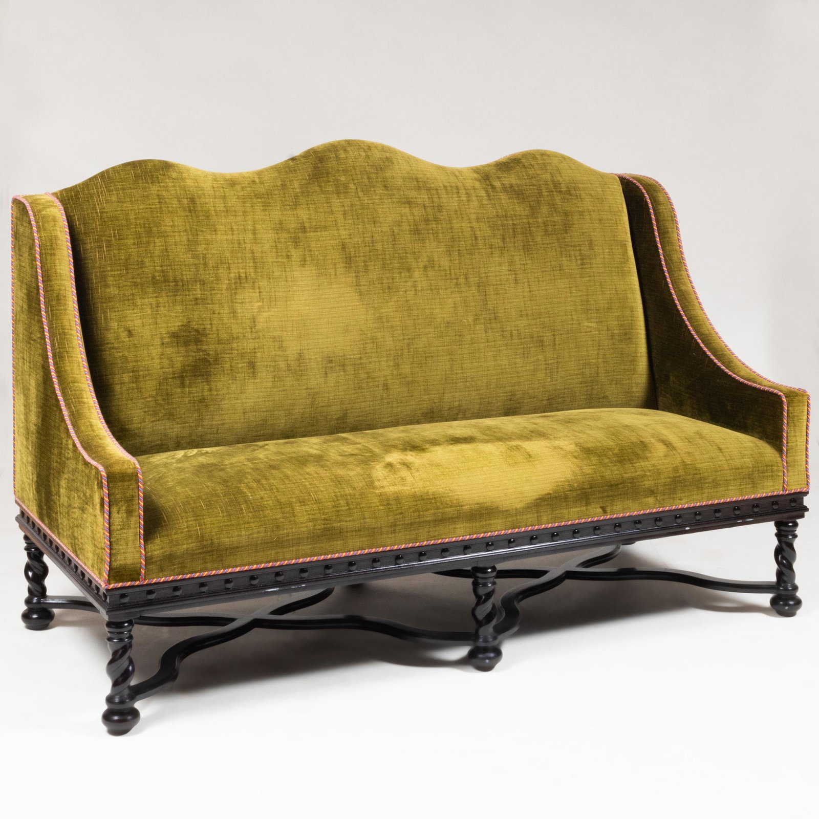Pair of Baroque Style Ebonized and Olive Green Velvet: Pair of Baroque Style Ebonized and Olive Green Velvet Upholstered Sofas 45 3/4 x 5 ft. 9 in. x 32 in.