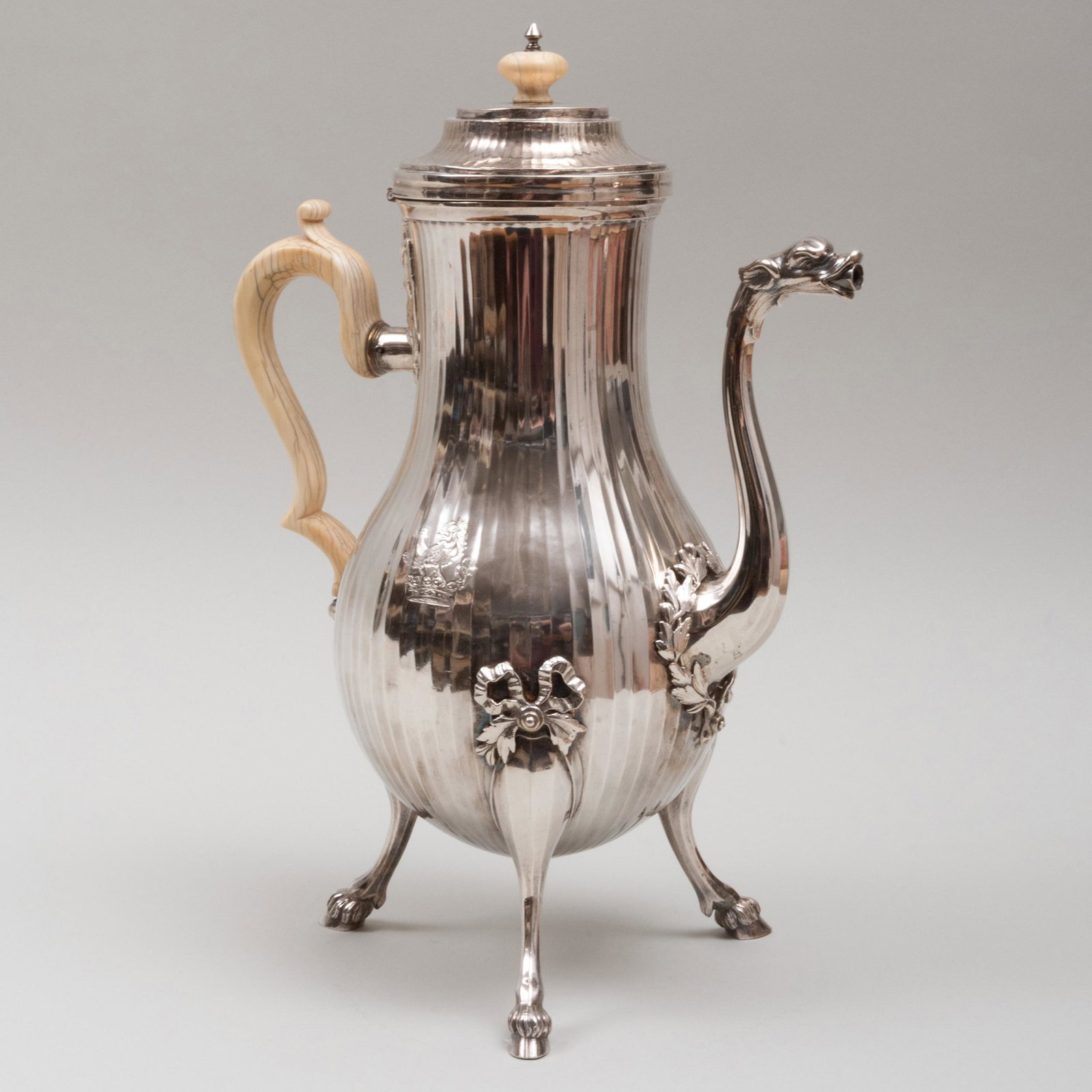 Belgian Silver Coffee Pot: Belgian Silver Coffee Pot Marked possibly for Ypres, 1786, engraved with a crest. 13 in. high, 38 oz. approx. weight. Please note: This lot is being offered for sale under a permit issued to the selle