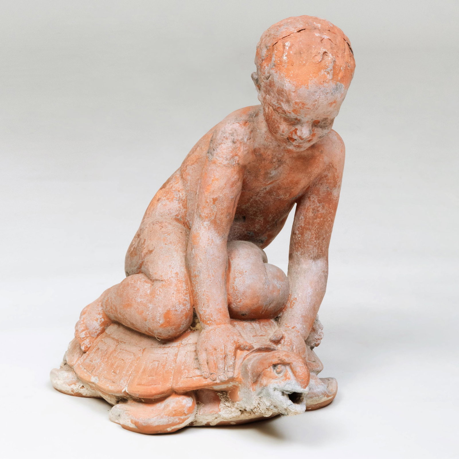 Terracotta Figure of a Little Boy on a Tortoise: Terracotta Figure of a Little Boy on a Tortoise 19 x 12 x 19 in. By repute Galerie Stéphane Olivier, Paris. Masterful Mix : A Residence Designed by Stephen Sills for Barbara Cirkva and John Schumache