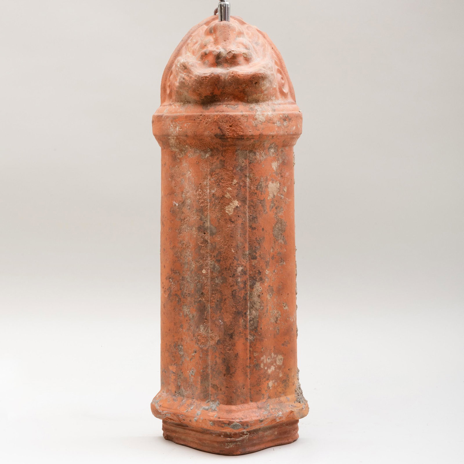 Continental Terracotta Lion Mask Roof Tile Mounted as a: Continental Terracotta Lion Mask Roof Tile Mounted as a Lamp On a polished steel base. The tile 21 3/4 x 8 x 4 1/2 in., 26 x 10 x 6 1/2 in. (overall). Masterful Mix : A Residence Designed by Stephen S