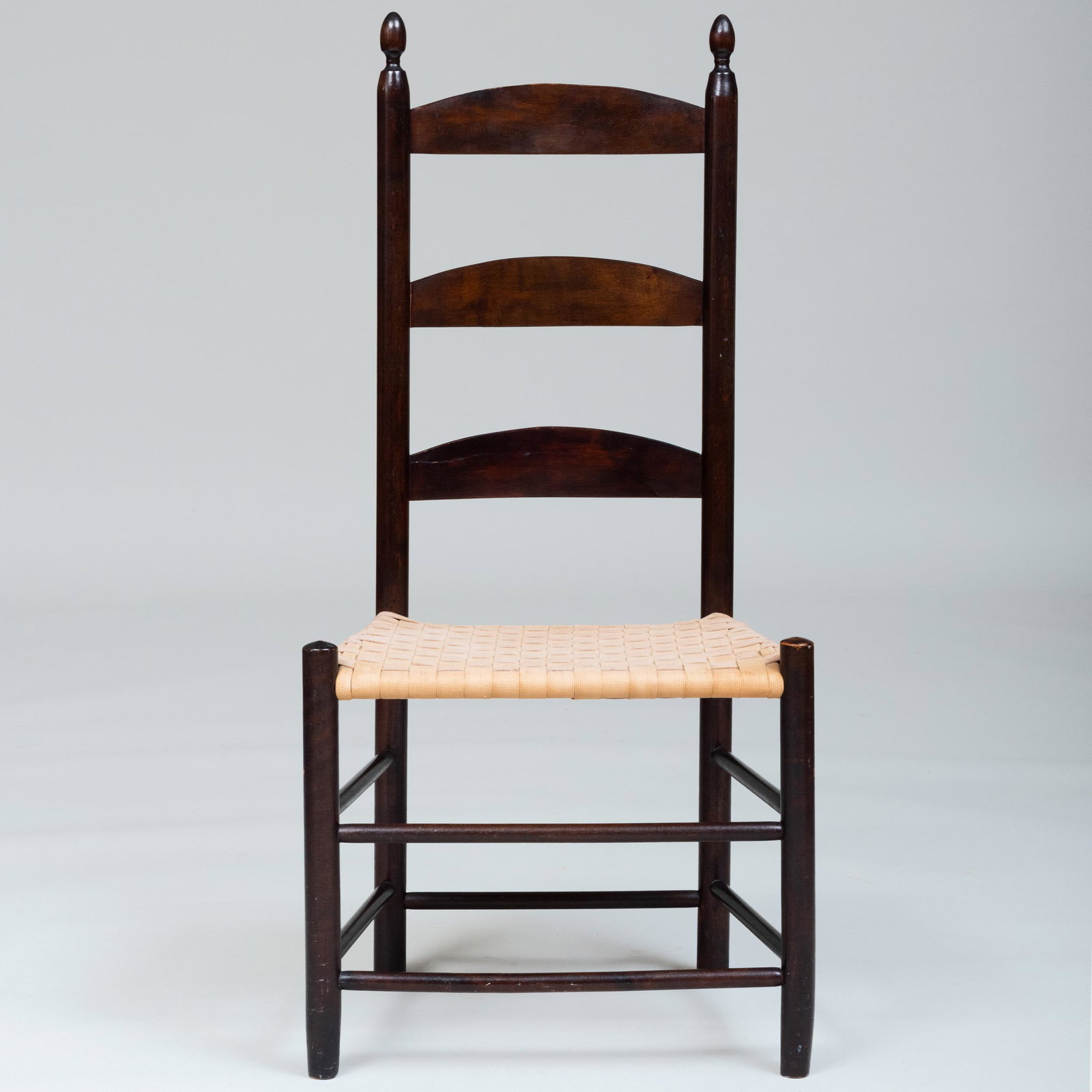 American Stained Wood Slat Back Shaker Side Chair: American Stained Wood Slat Back Shaker Side Chair Fitted with a woven seat. 40 x 19 x 15 in. Masterful Mix : A Residence Designed by Stephen Sills for Barbara Cirkva and John Schumacher