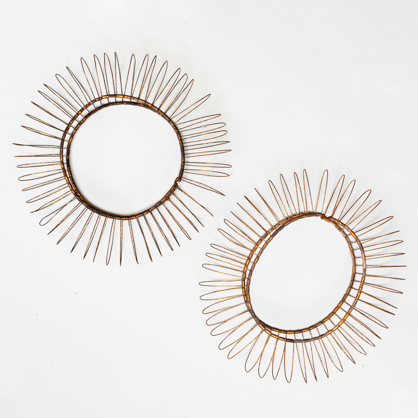 Pair of Gilt-Metal Wire Wall Ornaments: Pair of Gilt-Metal Wire Wall Ornaments 7 x 28 in. diam. Masterful Mix : A Residence Designed by Stephen Sills for Barbara Cirkva and John Schumacher