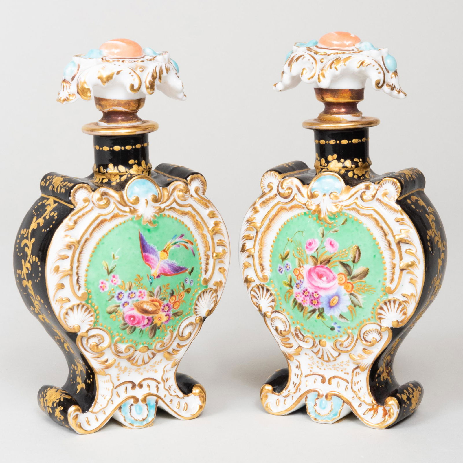Pair of Jacob Petit Porcelain Scent Bottles: Pair of Jacob Petit Porcelain Scent Bottles Blue painted mark. 6 3/4 x 3 3/4 x 1 3/4 in. Property from the Collection of Ambassador and Mrs. Felix Rohatyn