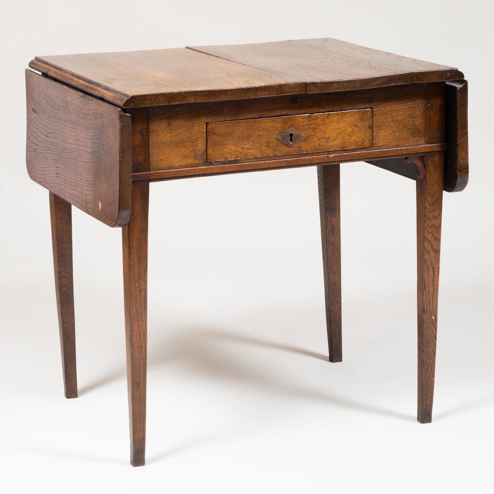 George III Provincial Oak Pembroke Table: George III Provincial Oak Pembroke Table 29 1/2 x 29 1/2 x 25 1/4 in. (closed), 29 1/2 x 47 x 25 1/4 in. (open). Property from the Collection of Ambassador and Mrs. Felix Rohatyn