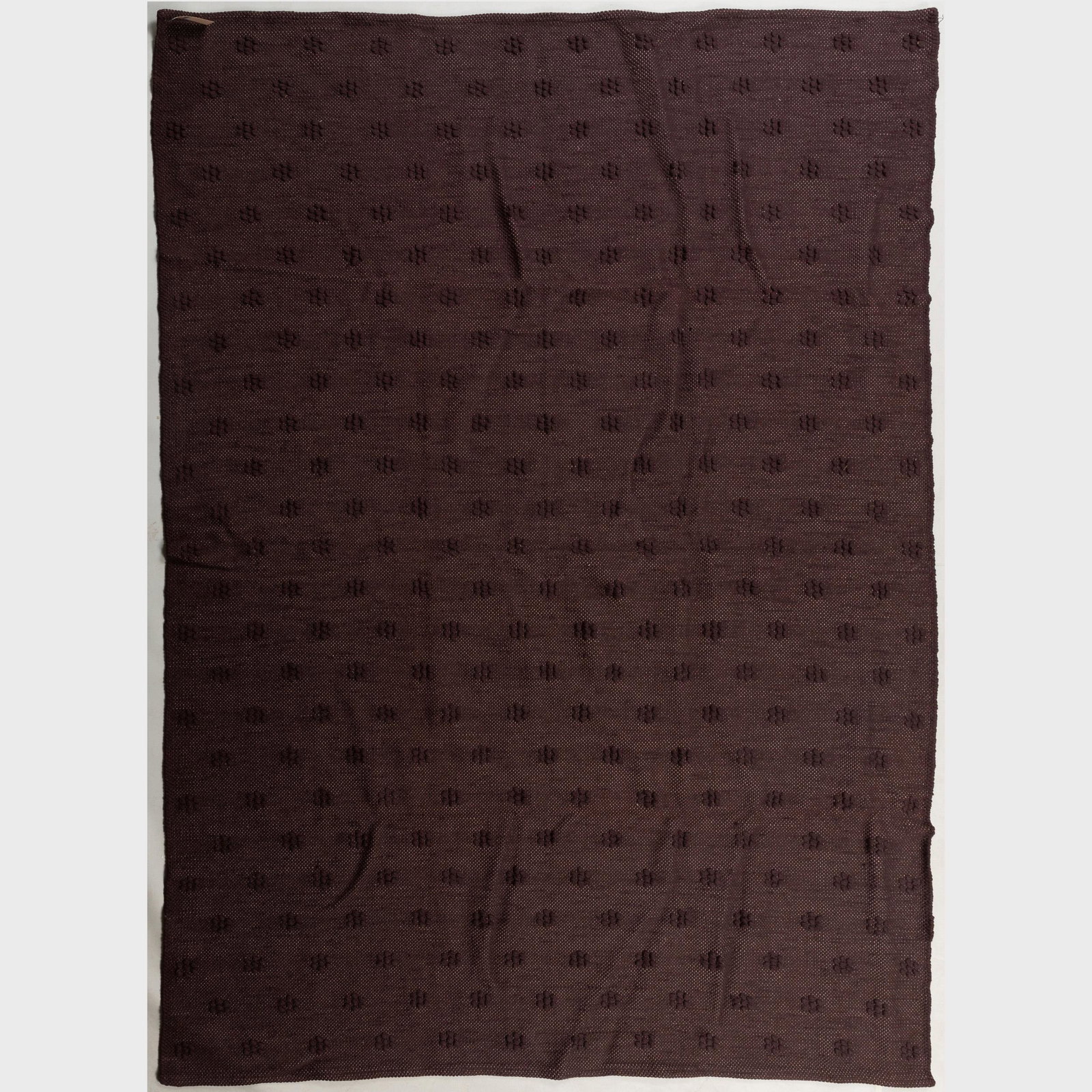 Stark Dark Purple High Low Pile Carpet: Stark Dark Purple High Low Pile Carpet Woven with a field of flower heads. 11 ft. 10 in. x 8 ft. 6 in.