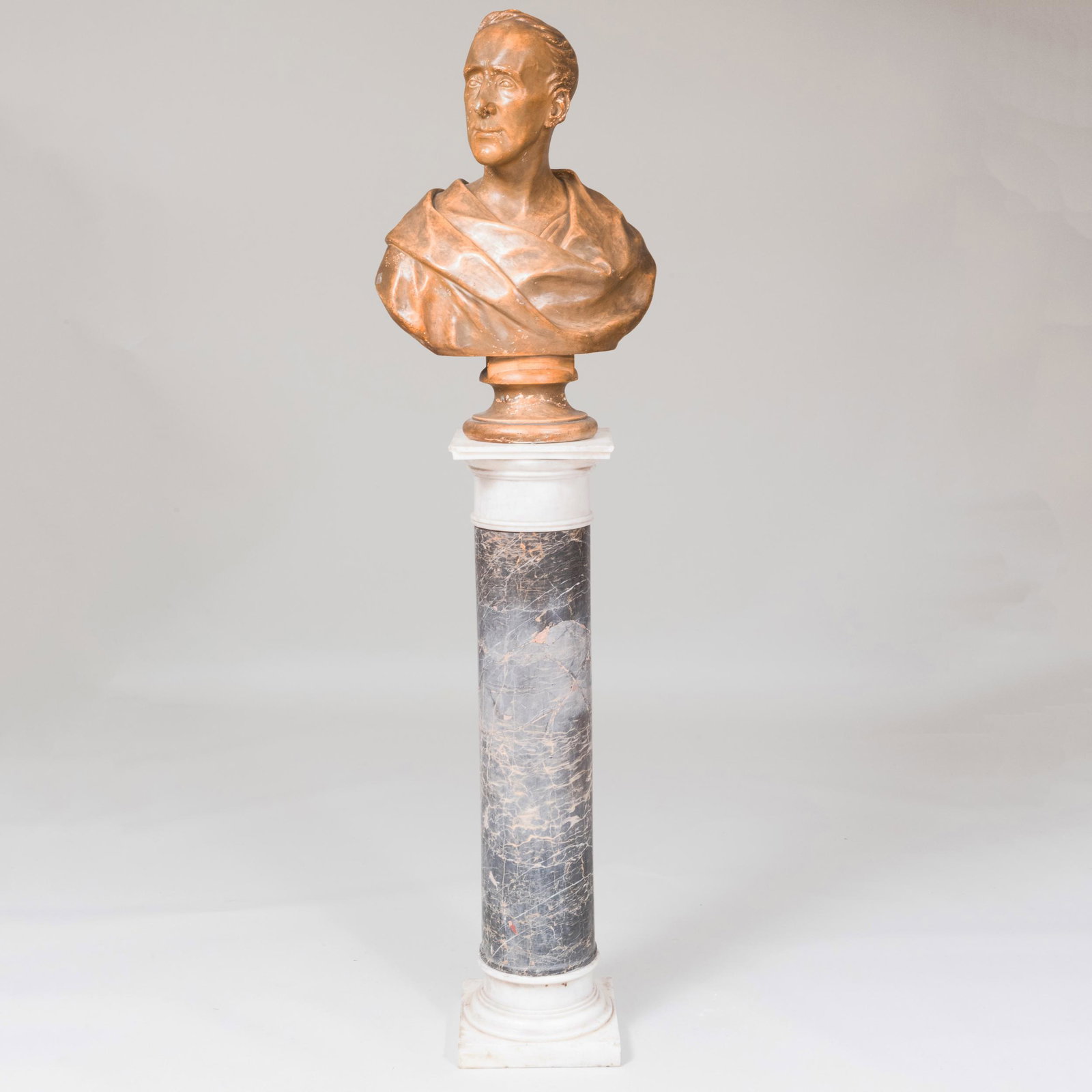 After Thomas Truman Spear (1803-1882): Plaster Bust of: After Thomas Truman Spear (1803-1882): Plaster Bust of a Man, Possibly Henry Clay The bust incised on reverse 'T.T' Spear, Sculpt. 1844'; together with an Egyptian Marble Column Pedestal. The bust 28 