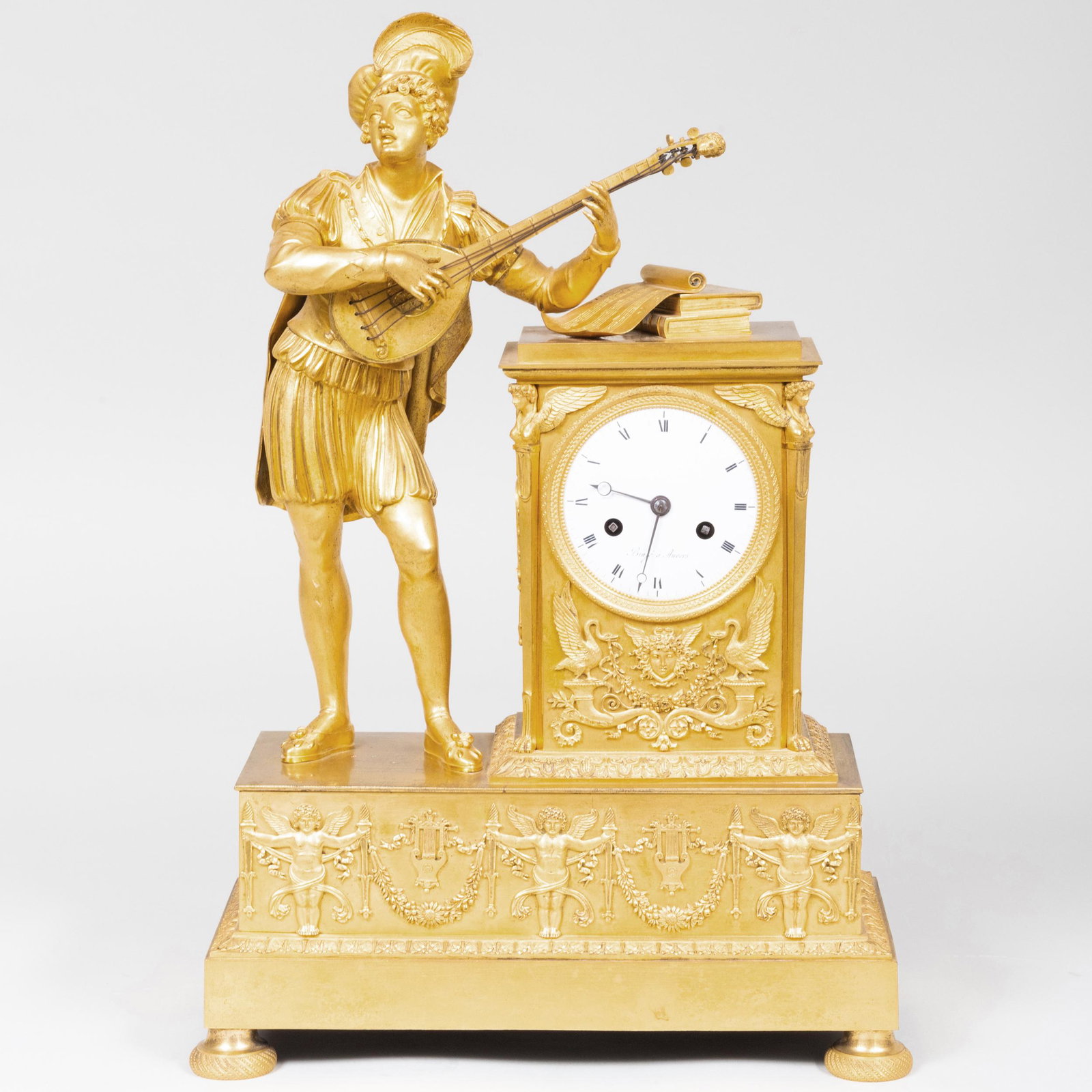 Empire Ormolu Figural Mantel Clock: Empire Ormolu Figural Mantel Clock Dial Signed 'Binje a Anvers'. 19 x 12 x 6 in. Property from the late Zane Studenroth