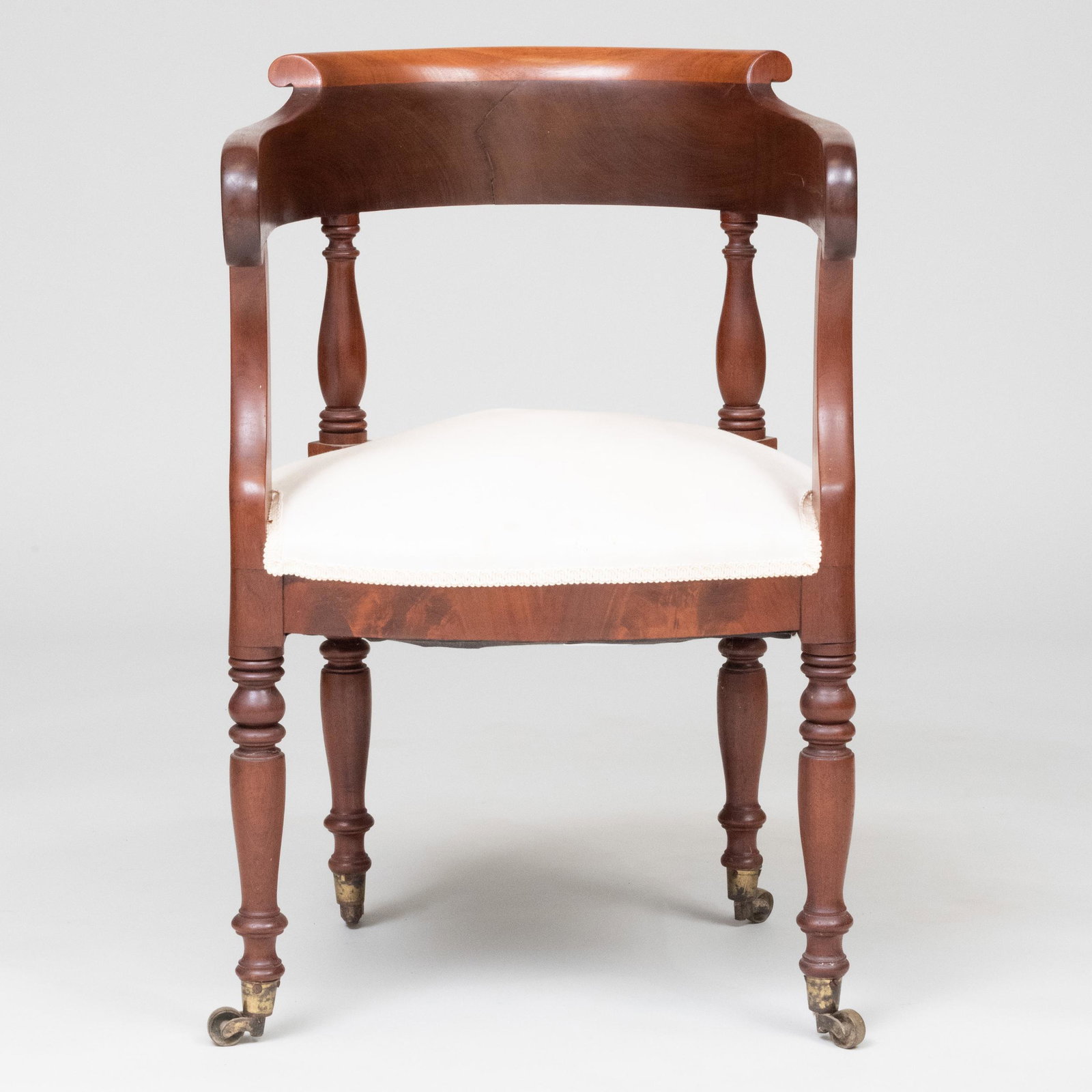 Federal Carved Mahogany Desk Chair: Federal Carved Mahogany Desk Chair Raised on casters. 31 x 19 3/4 x 20 1/2 in. Property from the late Zane Studenroth