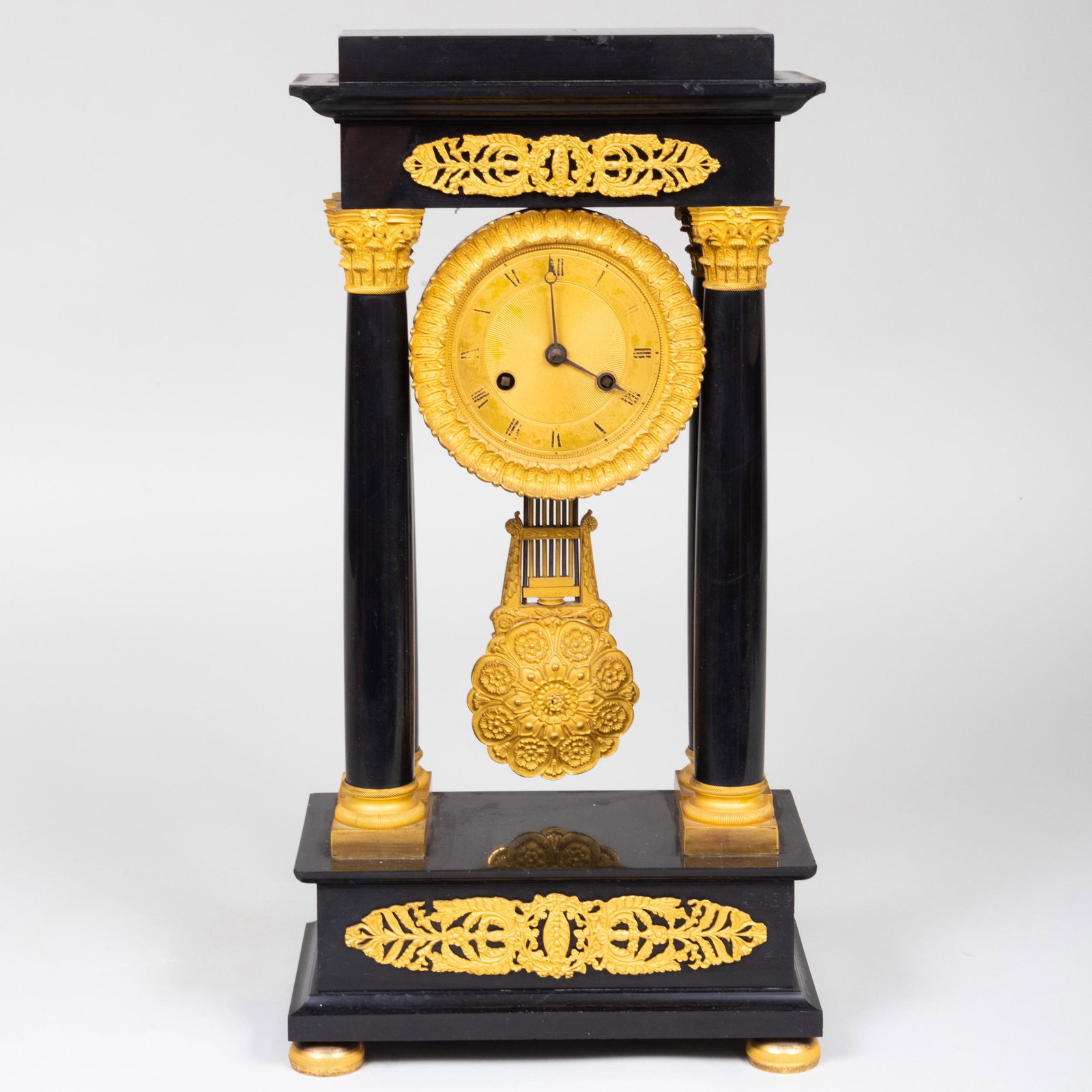 Empire Ormolu-Mounted Marble Mantel Clock: Empire Ormolu-Mounted Marble Mantel Clock Unsigned. 19 1/4 x 10 x 5 in. Property from the late Zane Studenroth
