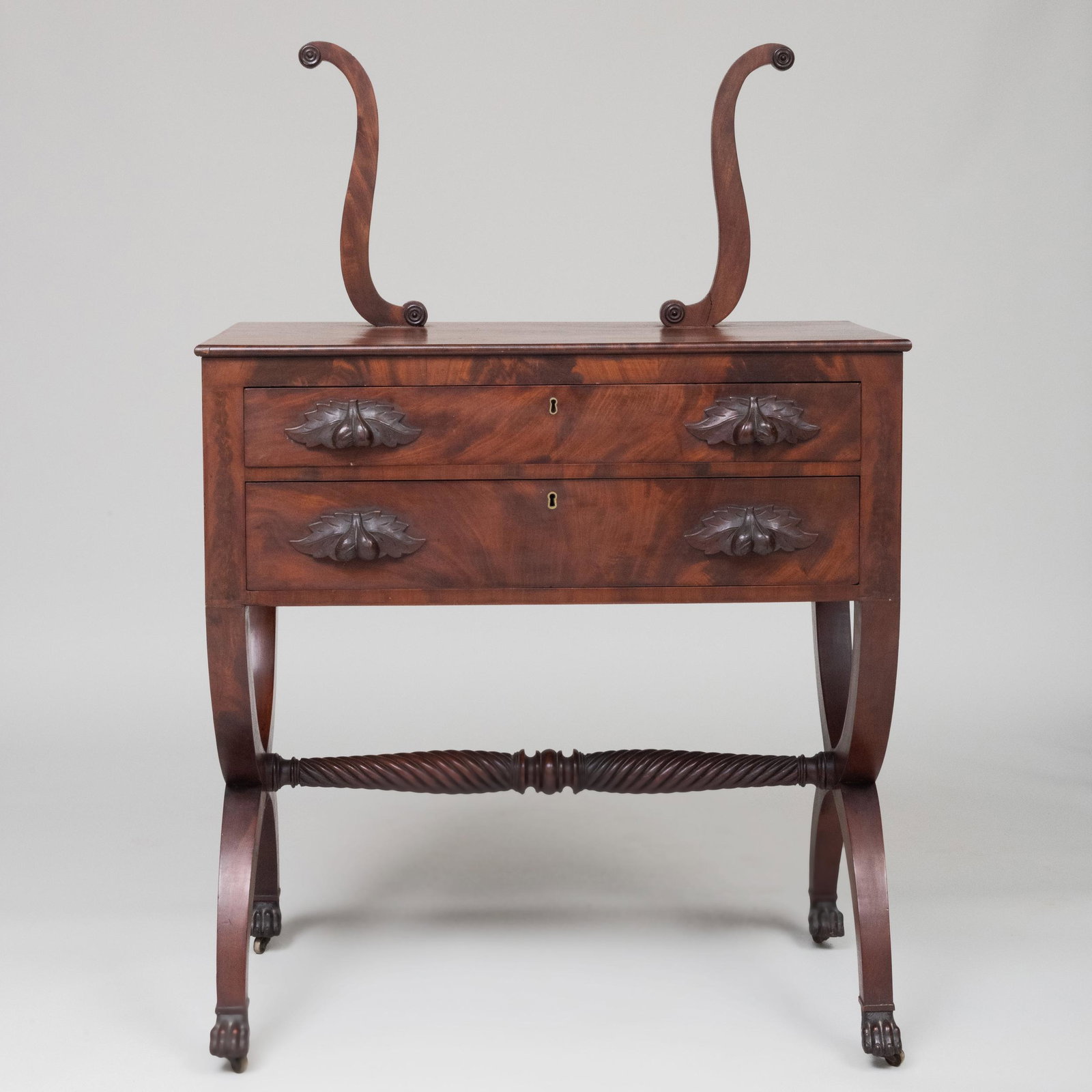 Late Federal Mahogany Dressing Table: Late Federal Mahogany Dressing Table With later pulls and lacking a central mirror plate. 4 ft. 5 1/2 in. x 35 3/4 x 18 1/2 in. Property from the late Zane Studenroth