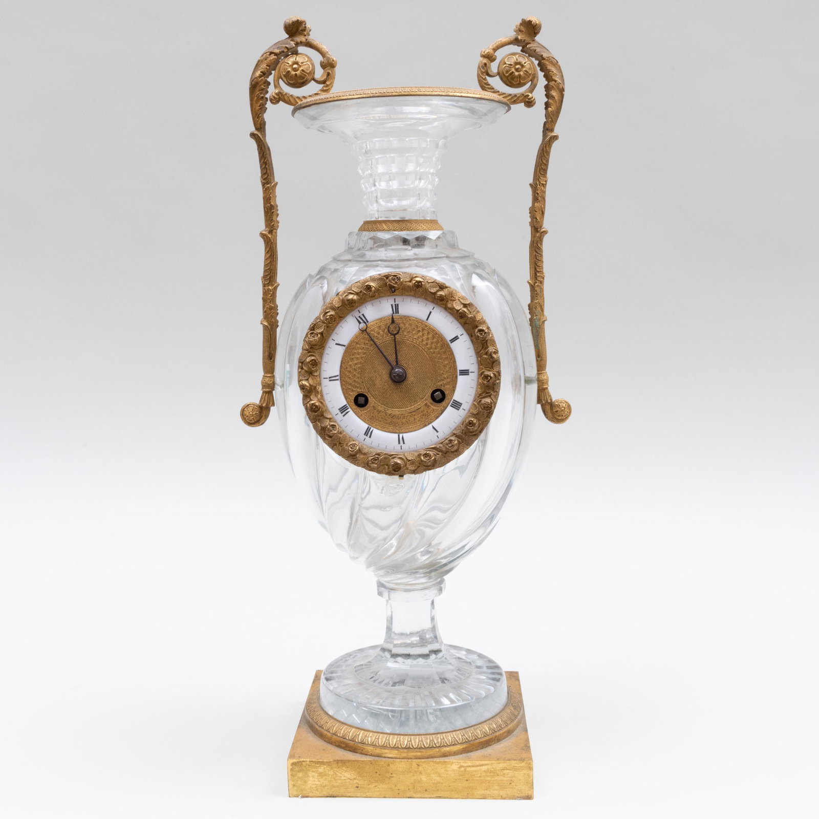 Charles X Desarnaud Ormolu-Mounted Glass Urn Form Clock: Charles X Desarnaud Ormolu-Mounted Glass Urn Form Clock The dial signed 'Desarnaud a L'Escalier de Cristal'. 17 x 7 1/2 x 6 in. Property from the late Zane Studenroth