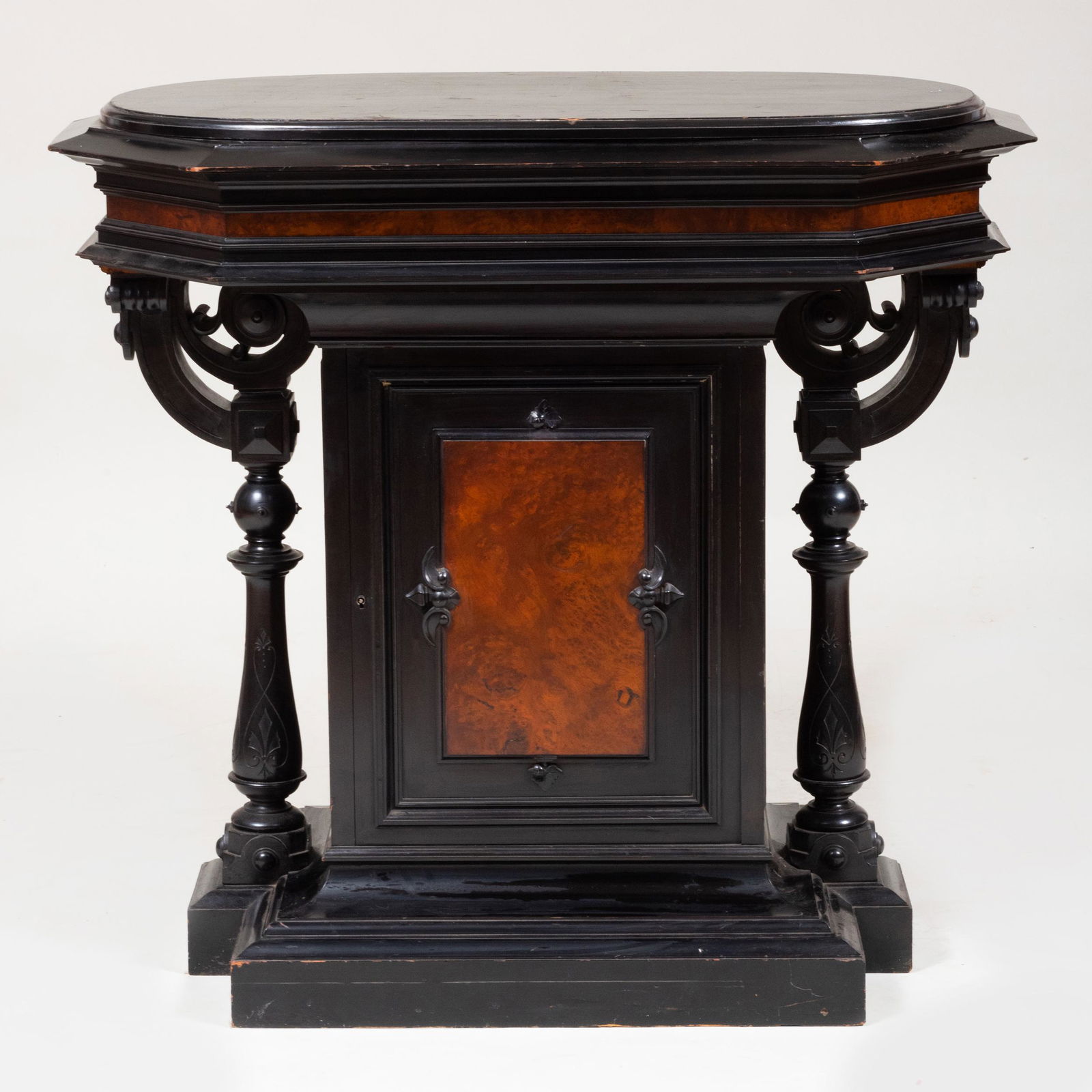 American Renaissance Revival Ebonized and Figured Maple: American Renaissance Revival Ebonized and Figured Maple Pedestal Fitted with one cabinet door, currently locked without a key. 38 3/4 x 41 1/2 x 22 1/2 in.