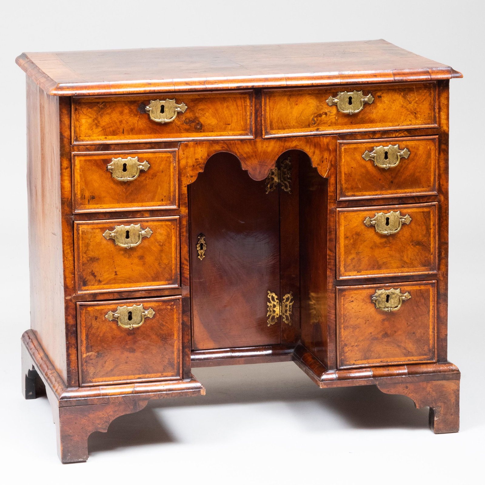 George II Inlaid and Figured Walnut Dressing Table: George II Inlaid and Figured Walnut Dressing Table Fitted with a paper label on the reverse ' Barnby, Bendall & Co., Ltd., Depository, Cheltenham, Legard, 121'. 29 x 32 x 20 3/4 in. Property from the 