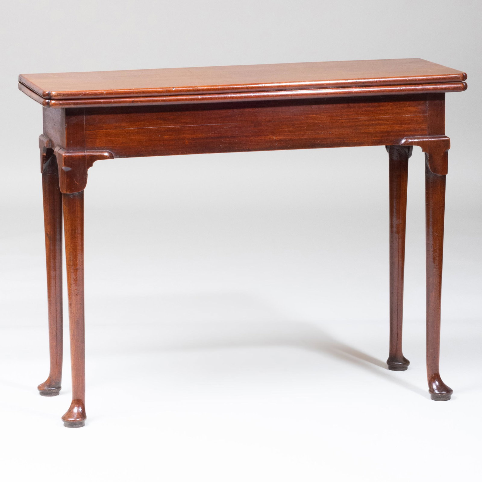 George II Mahogany Games Table: George II Mahogany Games Table Fitted with a drawer on the right side. 29 x 37 1/2 x 13 in. (closed); 29 x 37 1/2 in. x 25 3/4 in. (open). Property from the Estate of Carol O. Selle
