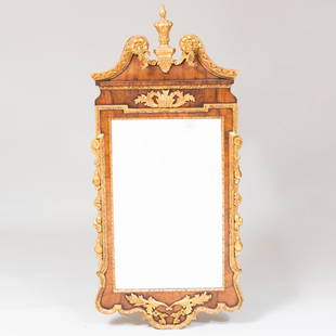 George II Walnut Parcel-Gilt Mirror: George II Walnut Parcel-Gilt MirrorComposed of later elements, the finial, the side fruited garlands and a small section of the backside of the top crest. 4 ft. 7 in. x 25 1/4 in.