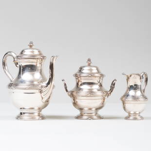 Tetard Freres Silver Three Piece Coffee Service: Tetard Freres Silver Three Piece Coffee ServiceMarked '.950'.Comprising:A coffee pot and hinged coverA sugar bowl and coverA cream jugThe coffee pot 8 3/4 in. high, 46 oz. approx. gross weight.