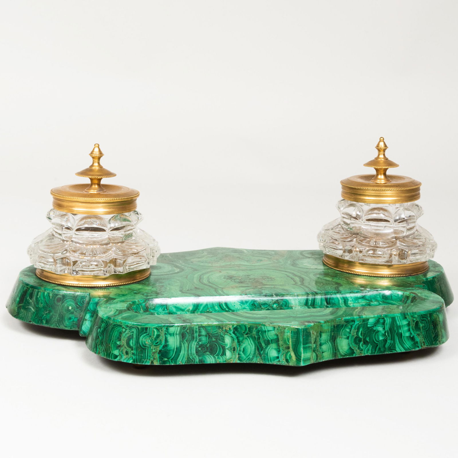 Continental Malachite Gilt-Metal-Mounted Cut Glass: Continental Malachite Gilt-Metal-Mounted Cut Glass Inkstand Fitted with two inkwells. 6 x 16 x 10 in. The Collection of Dr. Daniel and Myrna Clyman