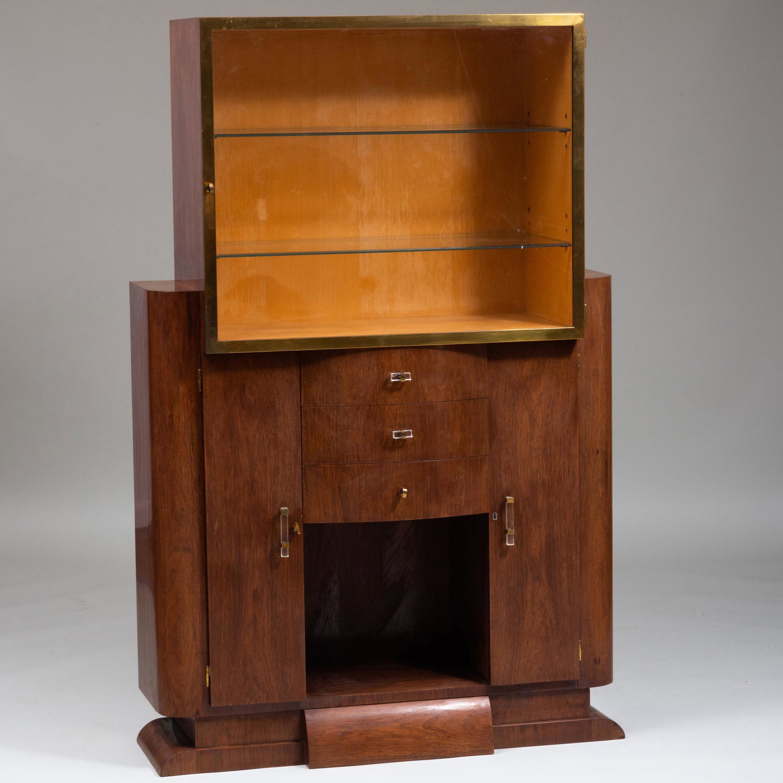 American Art Deco Brass-Mounted Hardwood and Glass: American Art Deco Brass-Mounted Hardwood and Glass Bookcase 5 ft. 1 1/4 x 3 ft. 3 in. x 14 1/2 in. Property from the Estate of Virginia M. Zabriskie