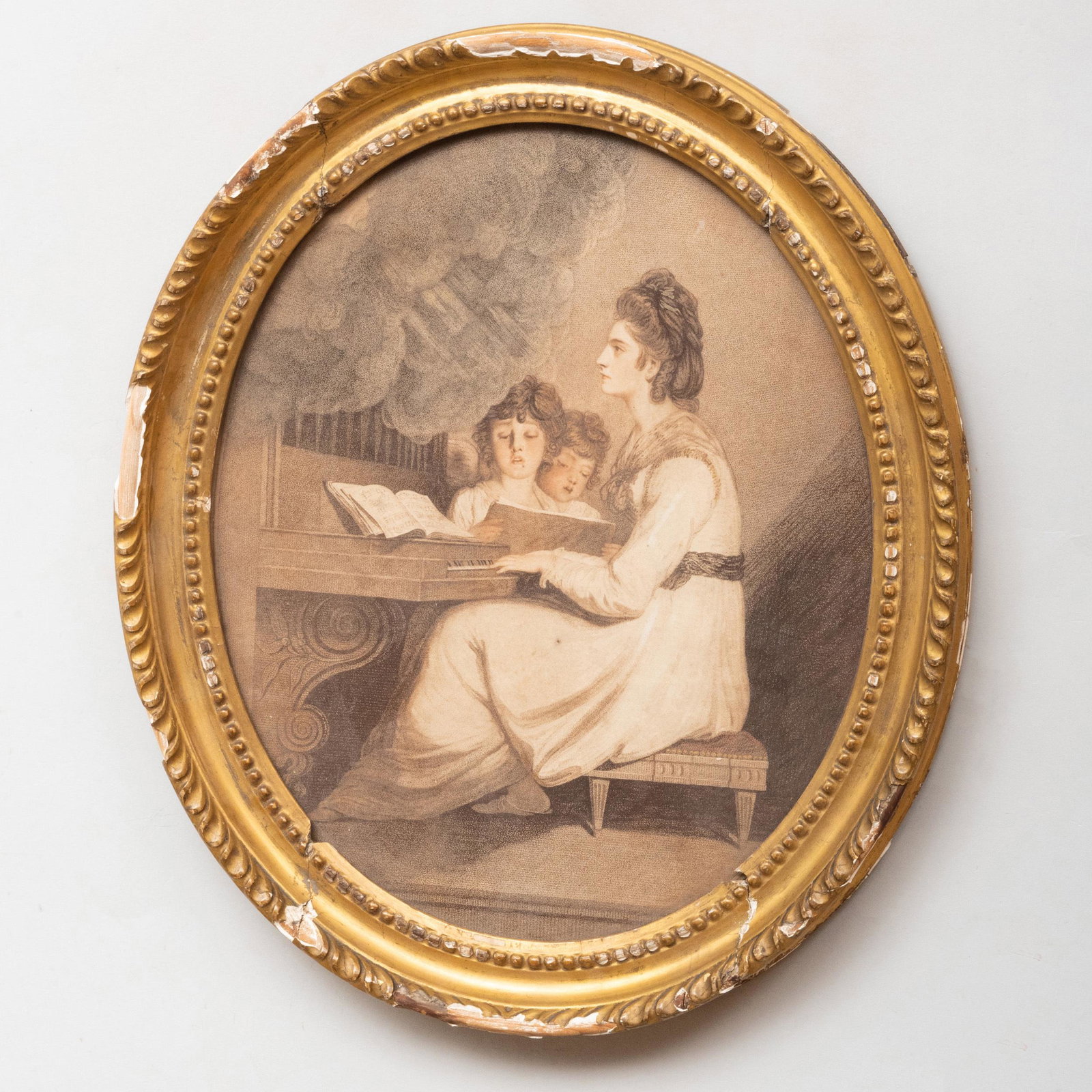 European School: At the Piano; and Classical Musician: European School: At the Piano; and Classical Musician Two engravings with hand-coloring on wove paper, unsigned, one with an indistinct label. Both 12 x 10 in. (sheet, oval), 14 x 12 in. (frame). Prop
