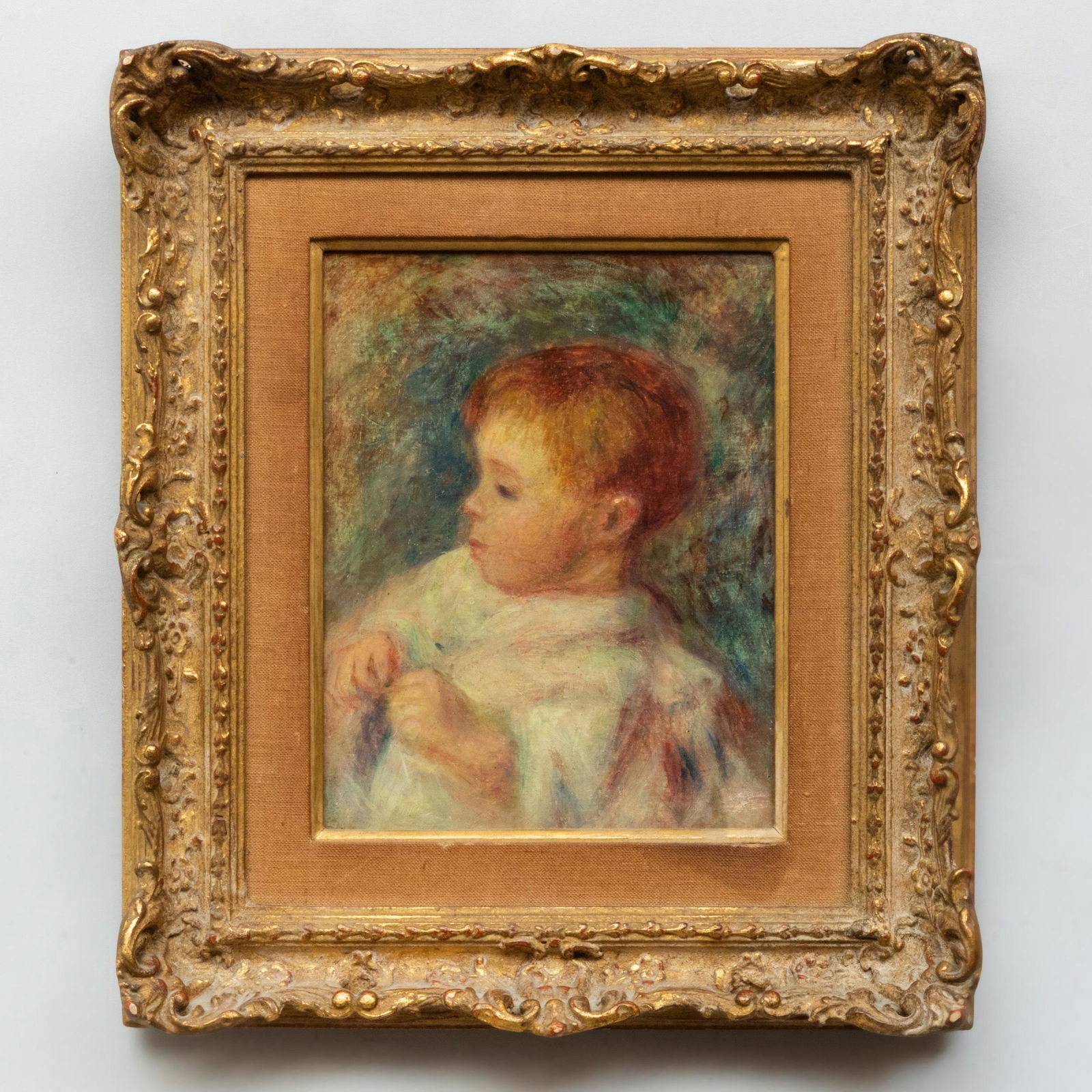 School of Pierre Auguste Renoir (1841-1919): Young: School of Pierre Auguste Renoir (1841-1919): Young Child Oil on canvas, unsigned, lined. 9 1/2 x 7 1/2 in., 15 1/2 x 13 1/2 in. (frame). Property from the Estate of Emile Wolf