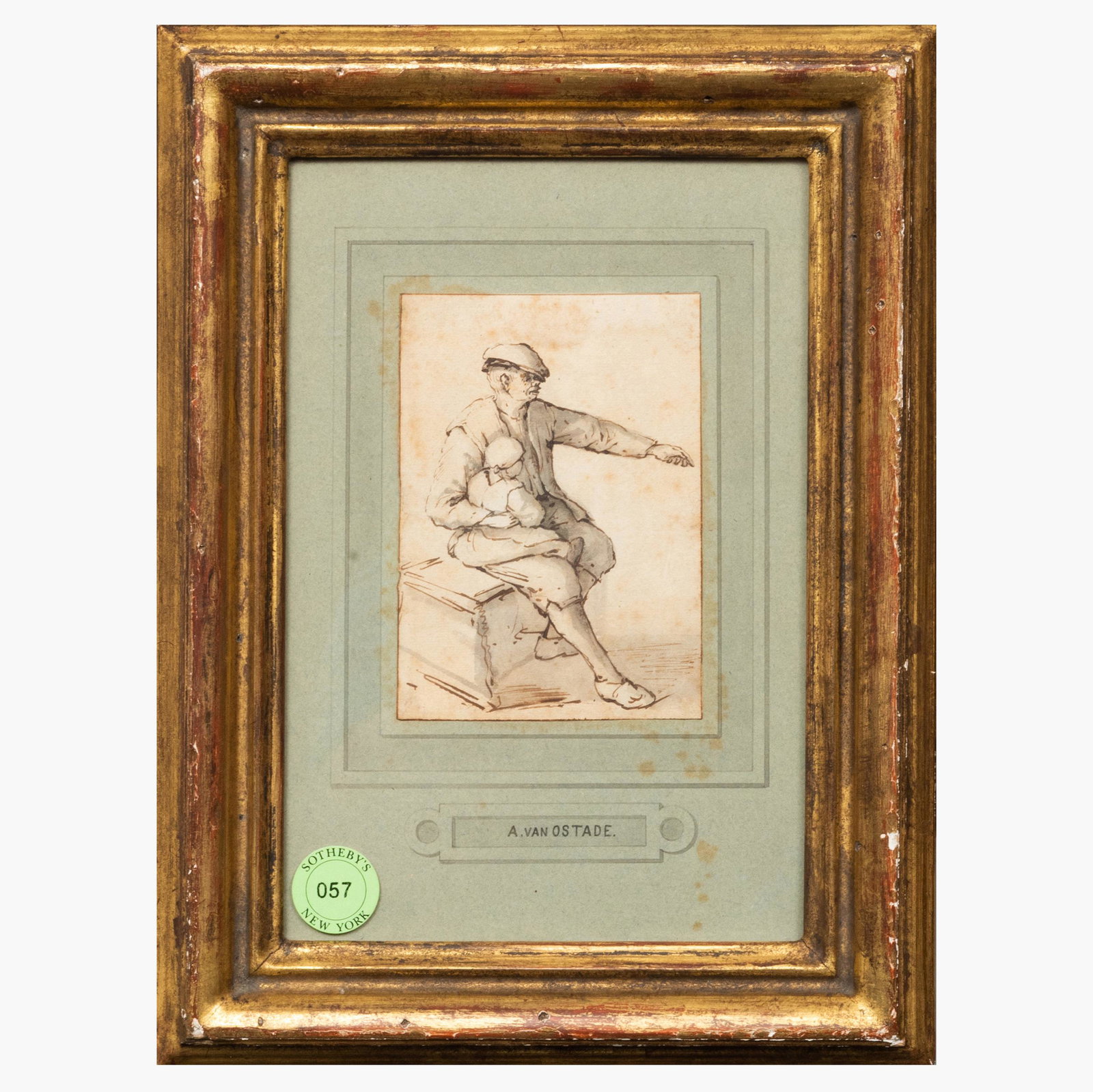 Follower of Adriaen van Ostade (1610-1685): A Man: Follower of Adriaen van Ostade (1610-1685): A Man Holding a Child Ink and wash on paper, inscribed 'V. Ostade' on the reverse. 4 3/8 x 3 3/8 in. (sheet), 12 x 9 in. (frame). Property from the Estate o