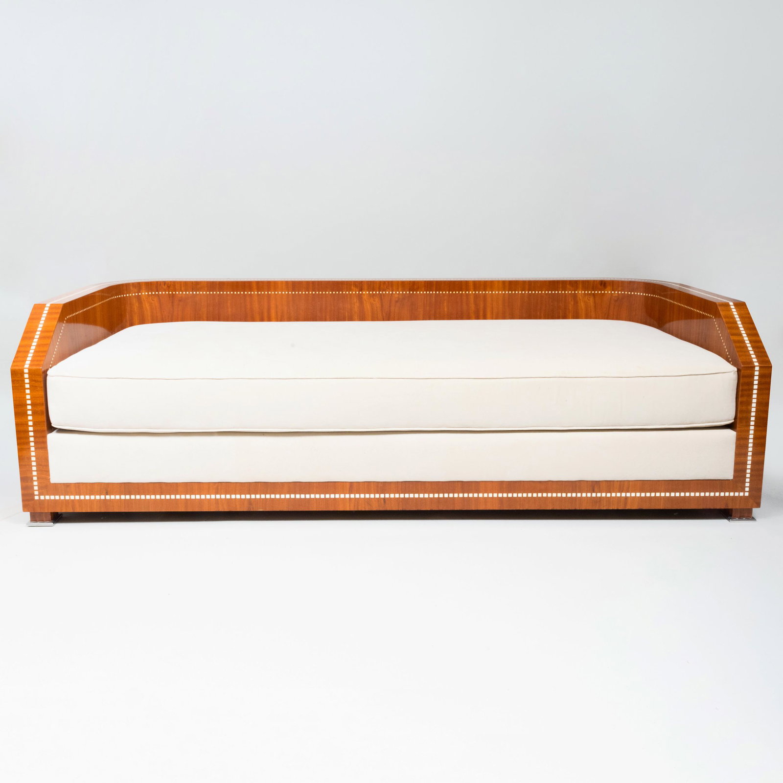 Art Deco Style Inlaid Tulipwood Sofa: Art Deco Style Inlaid Tulipwood Sofa With six loose pillows. 24 3/4 x 7 ft. 1 in. x 36 in.Christie's, New York, Property from the Hascoe Family Collection, July 22, 2014, Lot 661.