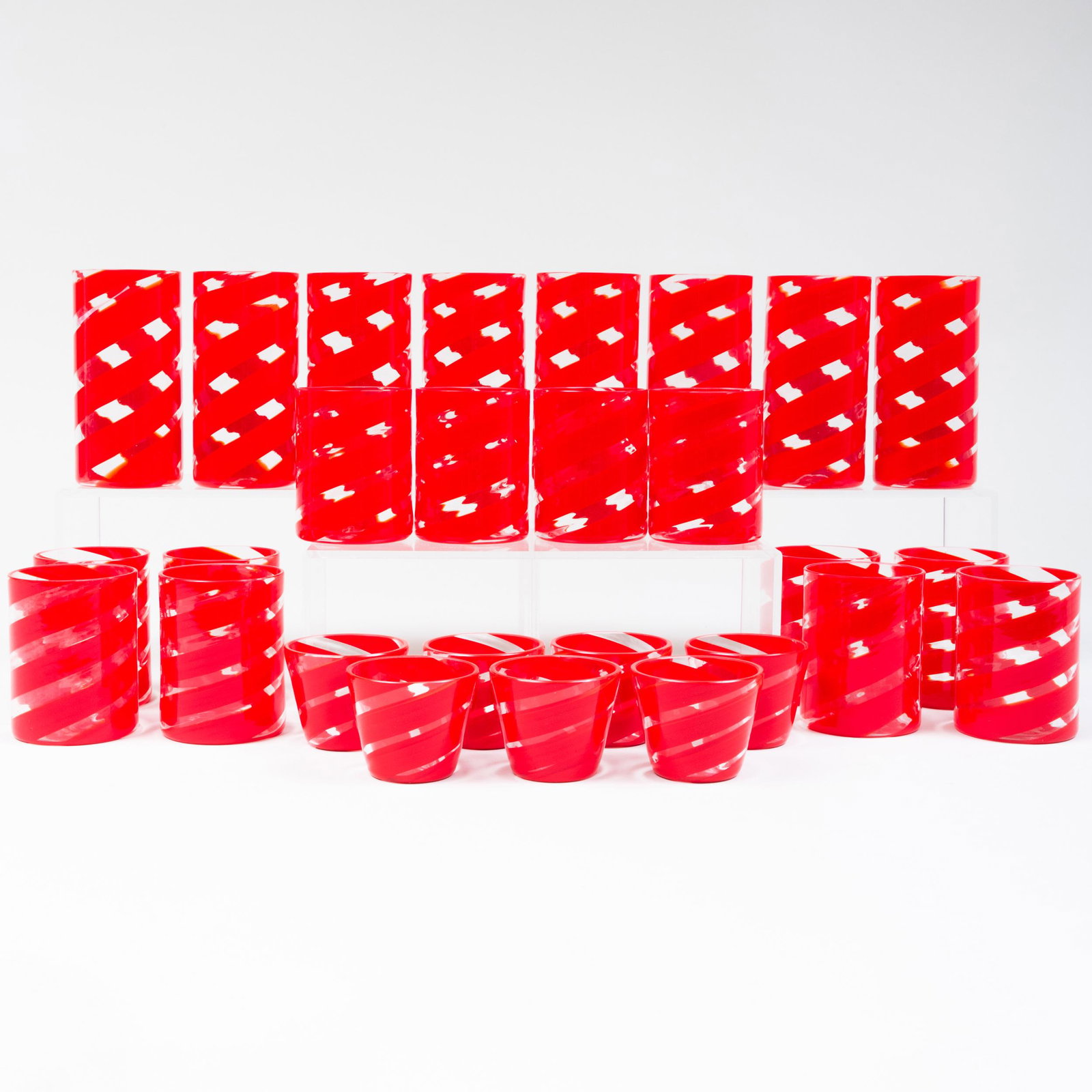 Set of Giorgio Armani Internally Decorated Glassware: Set of Giorgio Armani Internally Decorated Glassware Signed in etch. Comprising: Eight tumblers Eight low tumblers Six spirit glasses The tumblers 5 1/2 in. high, (22 pcs).