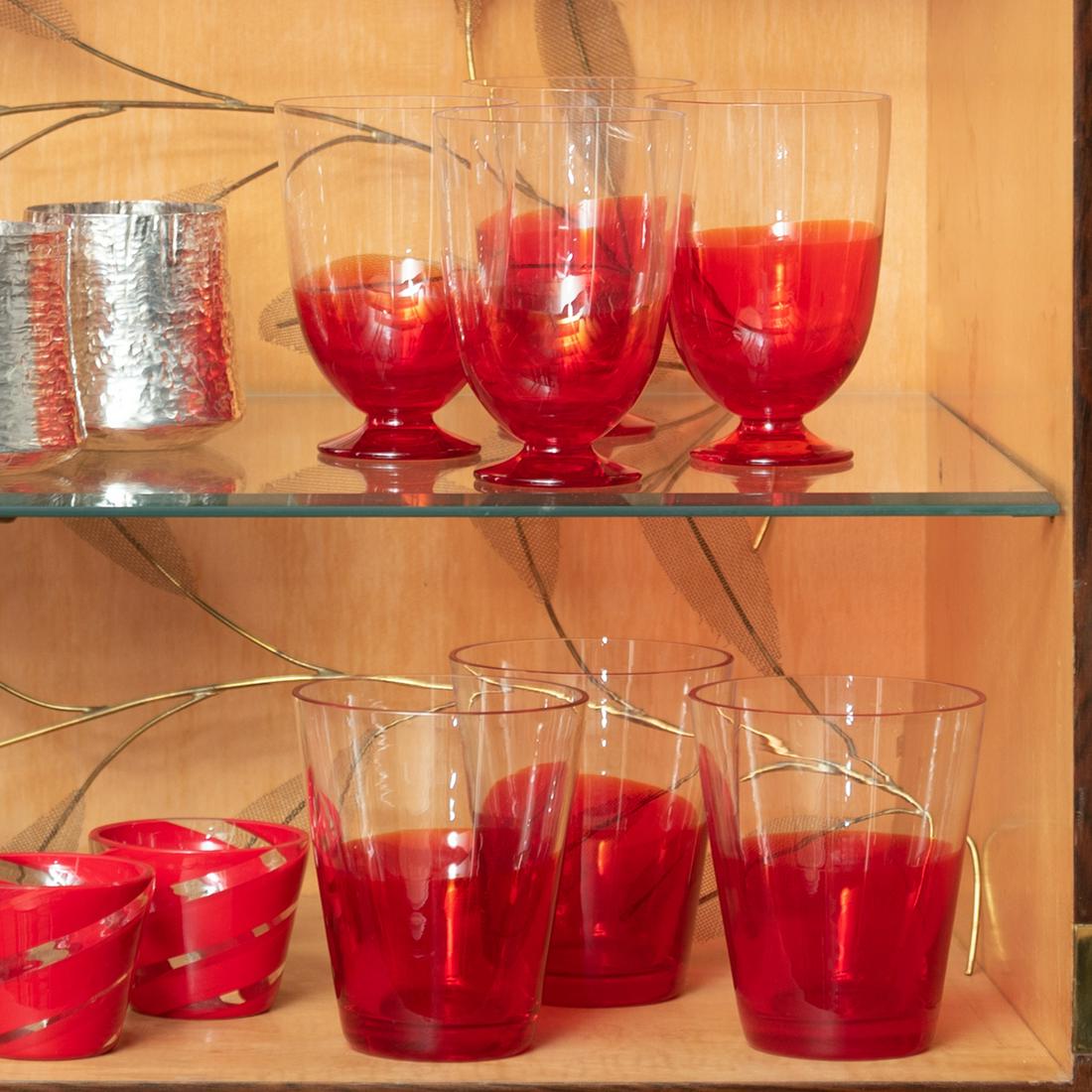 Set of Carlo Moretti Glassware: Set of Carlo Moretti Glassware Comprising: Fourteen champagne flutes Twelve water glasses Five footed glasses The flutes 7 in. high, (30 pcs).