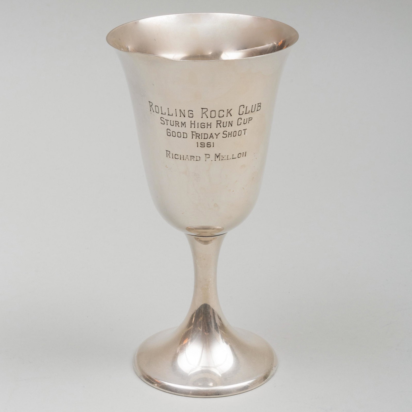 Gorham Silver Shooting Trophy and a Sheridan Silver: Gorham Silver Shooting Trophy and a Sheridan Silver Plate Historical Arms Trophy The Gorham trophy marked 'Sterling', inscribed 'Rolling Rock Club, Sturm High Run Cup, 1961, Richard P. Mellon'; the Sh
