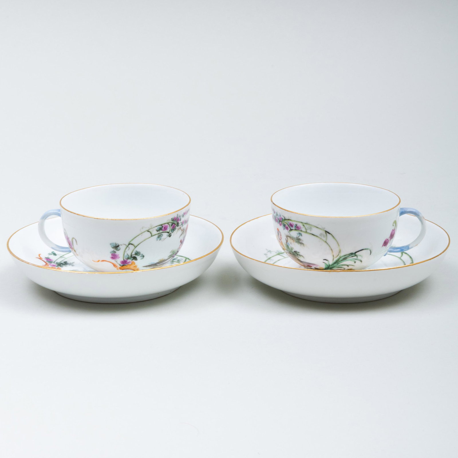 Pair of Meissen Teacups and Saucers Decorated with: Pair of Meissen Teacups and Saucers Decorated with Courting Couples Blue crossed swords and dot mark. The saucers 5 1/4 in. diam. The Estate of Richard P. Mellon, Ligonier, Pennsylvania