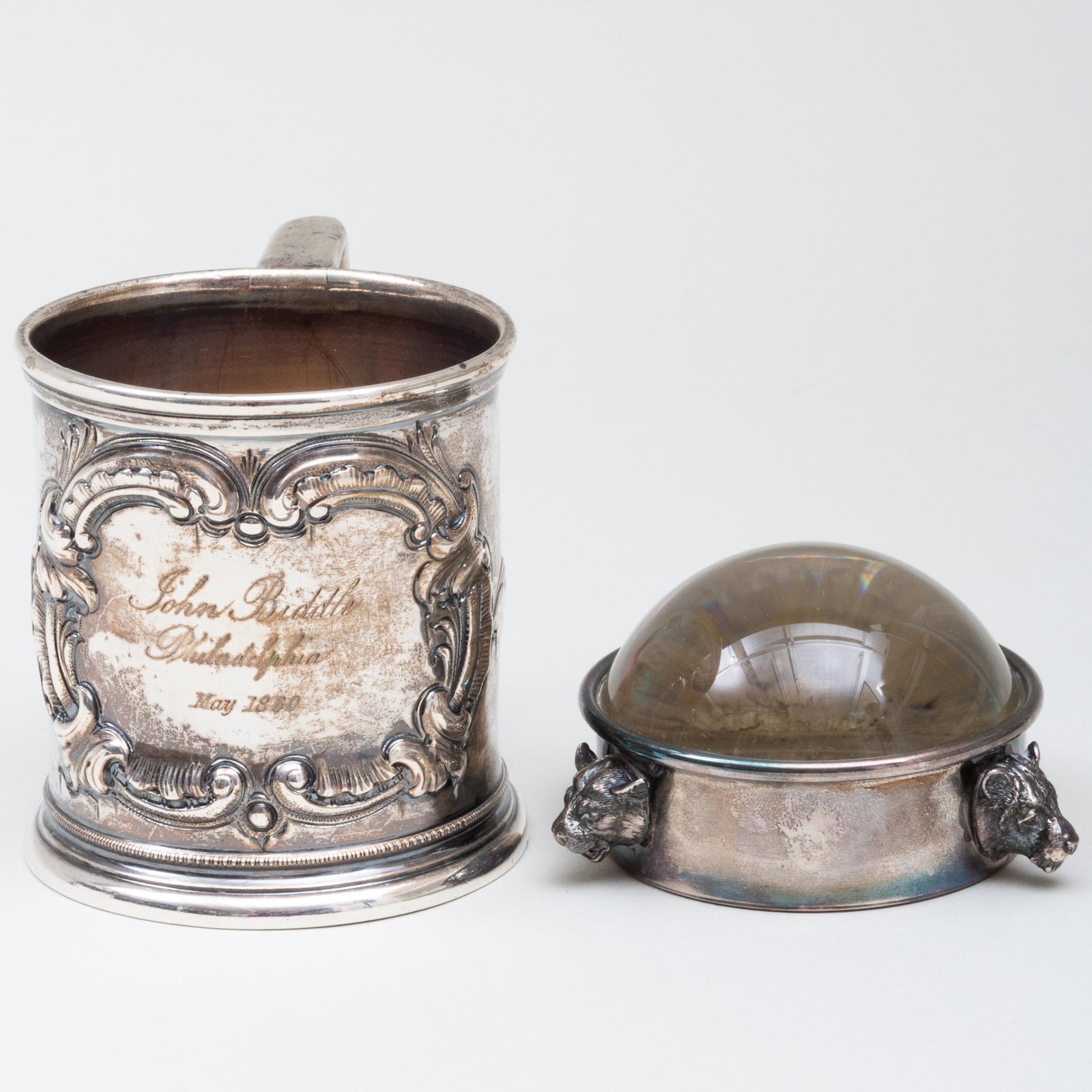 Italian Silver-Mounted Magnfying Glass and a J.E.: Italian Silver-Mounted Magnfying Glass and a J.E. Caldwell Coin Silver Christening Cup The glass marked for Milan and ',925'; the cup engraved 'John Biddle, Philadelphia, May 1860. The glass 3 1/4 in.