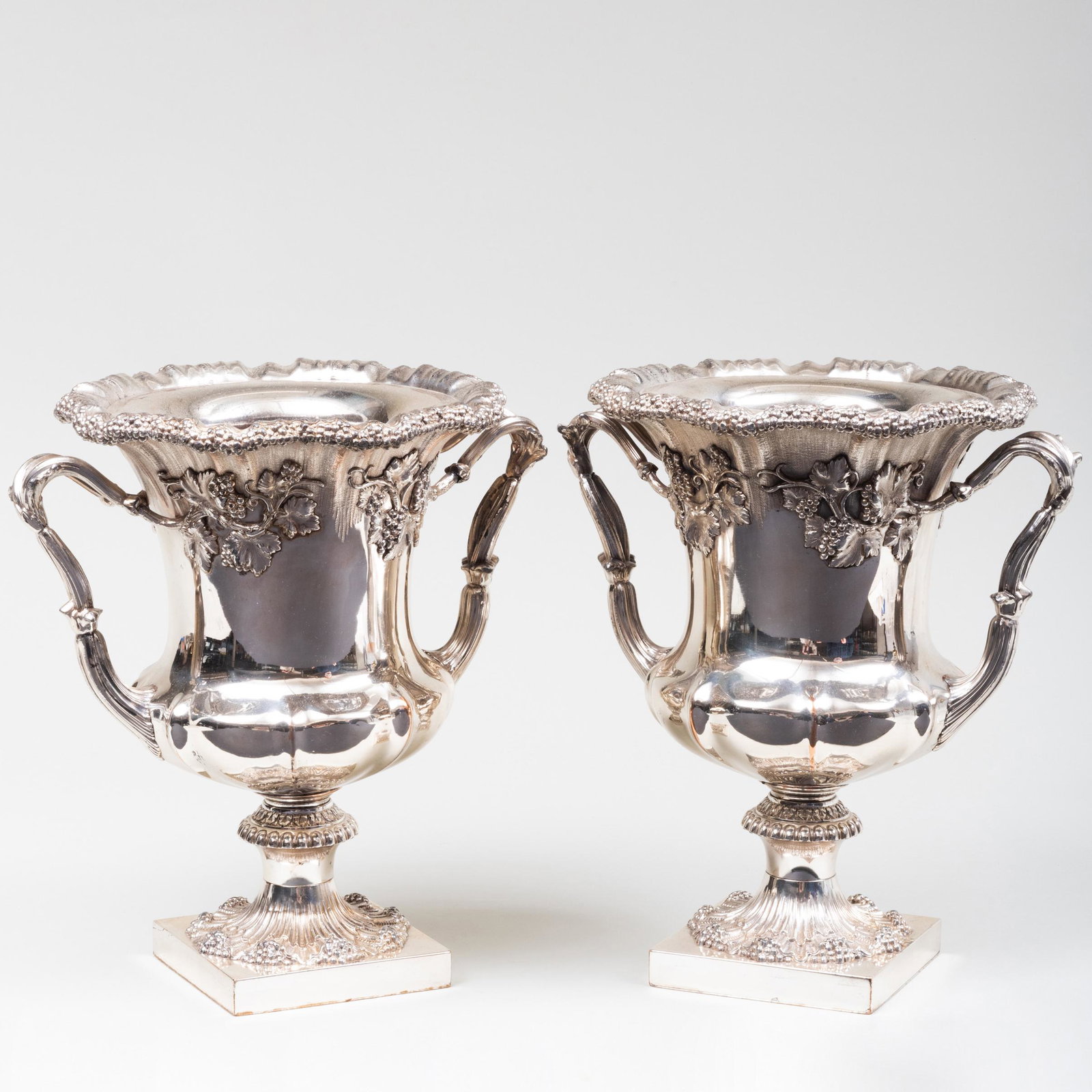 Pair of English Silver Plate Wine Coolers: Pair of English Silver Plate Wine Coolers 12 1/2 x 12 1/2 x 9 1/2 in. Property from the Estate of Audrey Zauderer