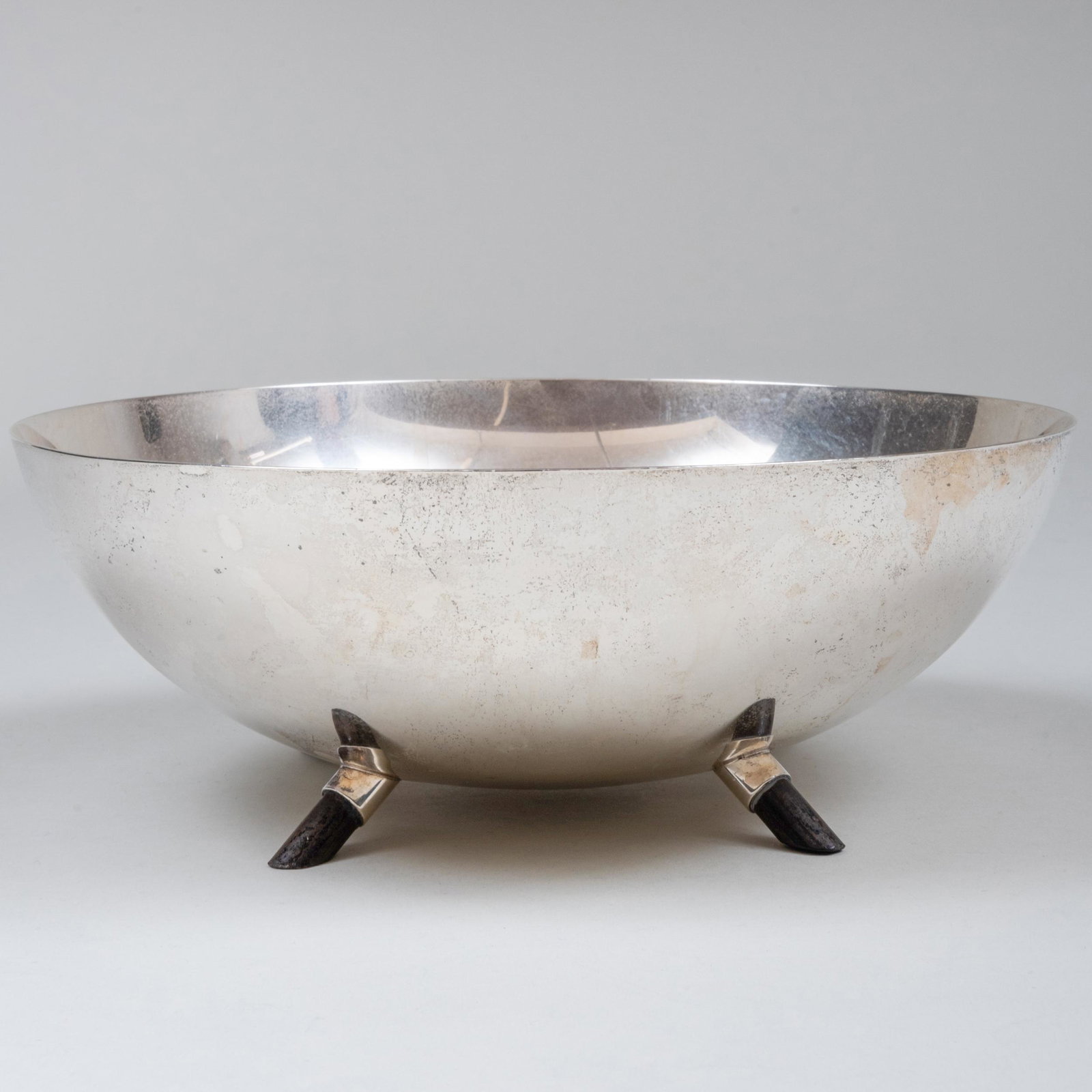Reed & Barton Modernist Silver Bowl with Ebonized Wood: Reed & Barton Modernist Silver Bowl with Ebonized Wood Feet Marked 'Sterling'. 3 3/8 x 9 in. diam, 16 oz. approx. gross weight.