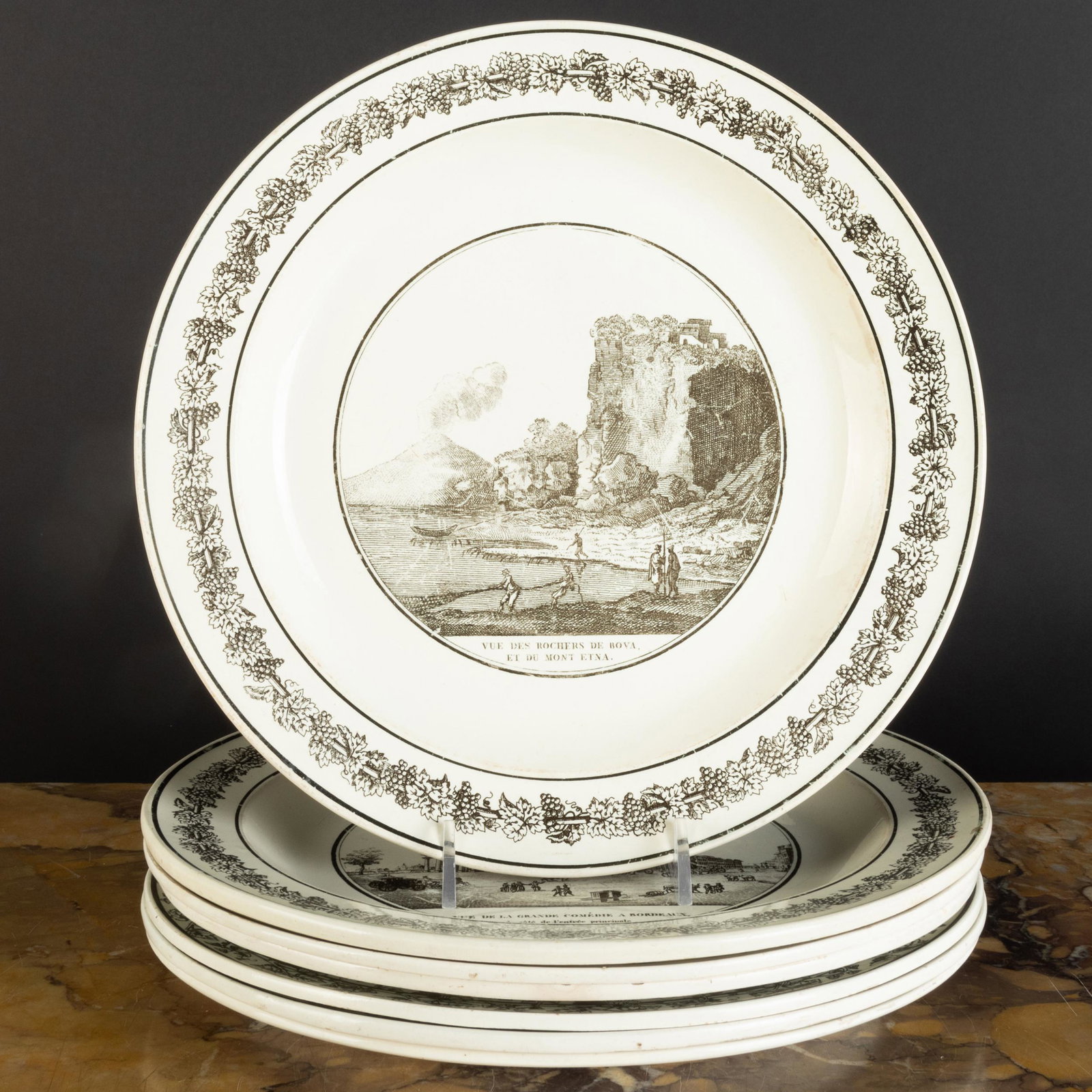 Group of Seven Stone, Coquerel et Le Gros Transfer: Group of Seven Stone, Coquerel et Le Gros Transfer Printed Creamware Plates Depicting Gardens and Architecture Black printed marks. 9 3/4 in. diam. The Neoclassicist: Niall Smith