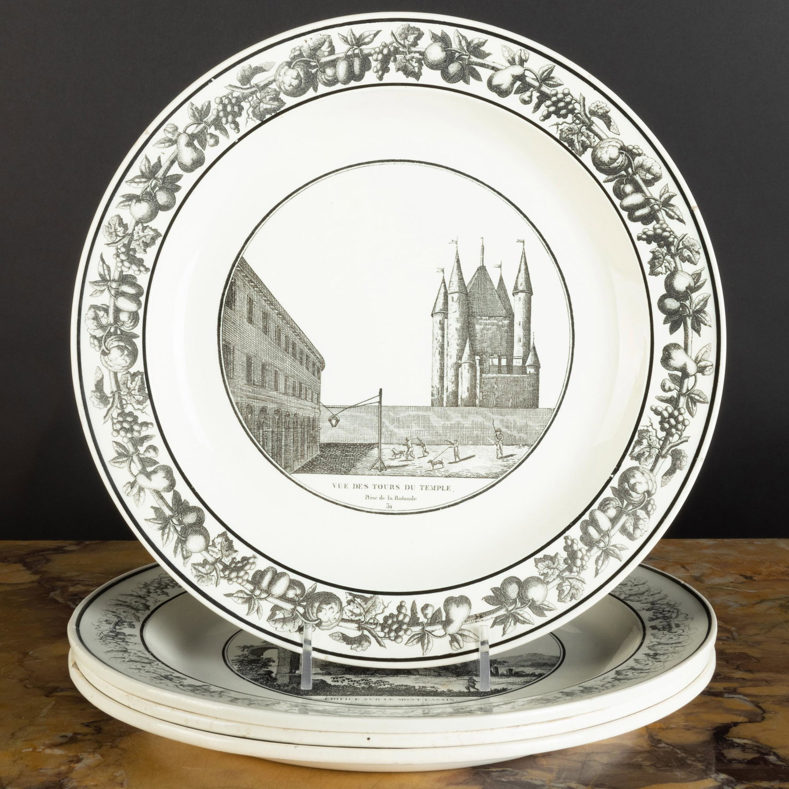 Group of Four Stone, Coquerel et Le Gros Transfer: Group of Four Stone, Coquerel et Le Gros Transfer Printed Creamware Architectural Plates Black printed mark. 9 3/4 in. diam. The Neoclassicist: Niall Smith