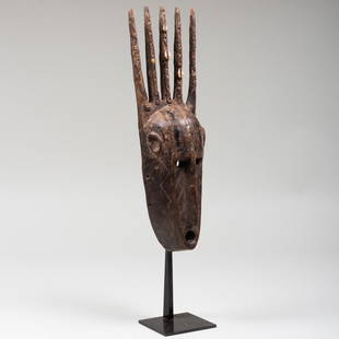 Bamana Carved Wood and Shell Decorated Mask, West: Bamana Carved Wood and Shell Decorated Mask, West Africa 24 1/2 x 5 x 4 1/2 in. overall. Height of mask 18 3/4 in. Property from the Collection of Tom Levine