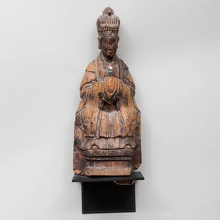 Chinese Polychromed Wood Figure of a Seated Immortal: Chinese Polychromed Wood Figure of a Seated Immortal Mounted on a metal bracket. The figure 17 in. high. Property from the Collection of Tom Levine