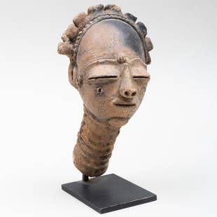 Akan Terracotta Head, Ghana: Akan Terracotta Head, Ghana 9 x 4 1/2 x 5 1/ 2in. overall. Sold Sotheby's, NY, The Collection of Walter Randel, New York, November 14, 2003, Lot 37. Property from the Collection of Tom Levine