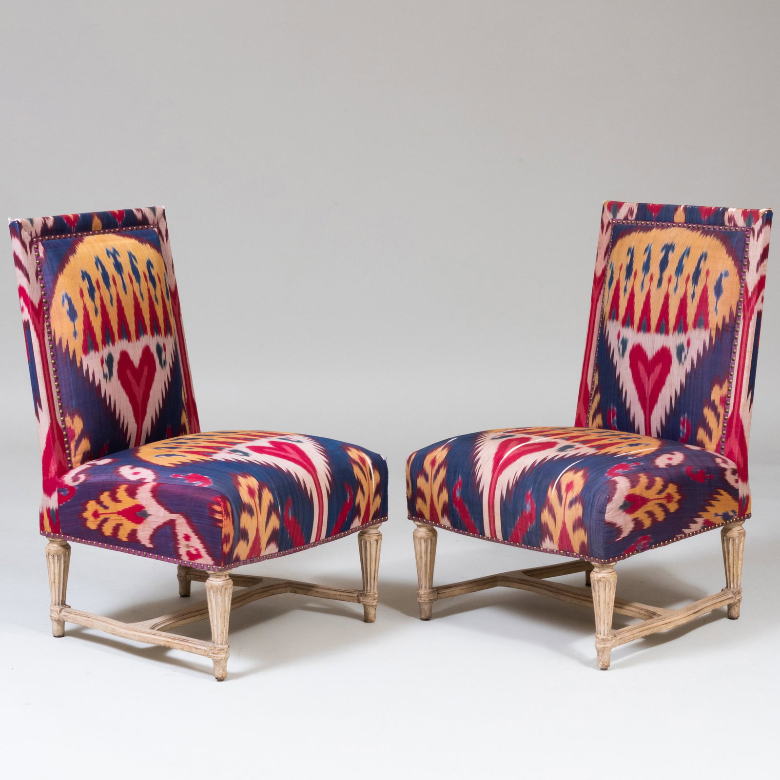 Pair of Louis XVI Style Ikat Upholstered Slipper Chairs: Pair of Louis XVI Style Ikat Upholstered Slipper Chairs 30 x 20 x 19 in. Property from the Collection of Peter van Hattum and Harold Simmons