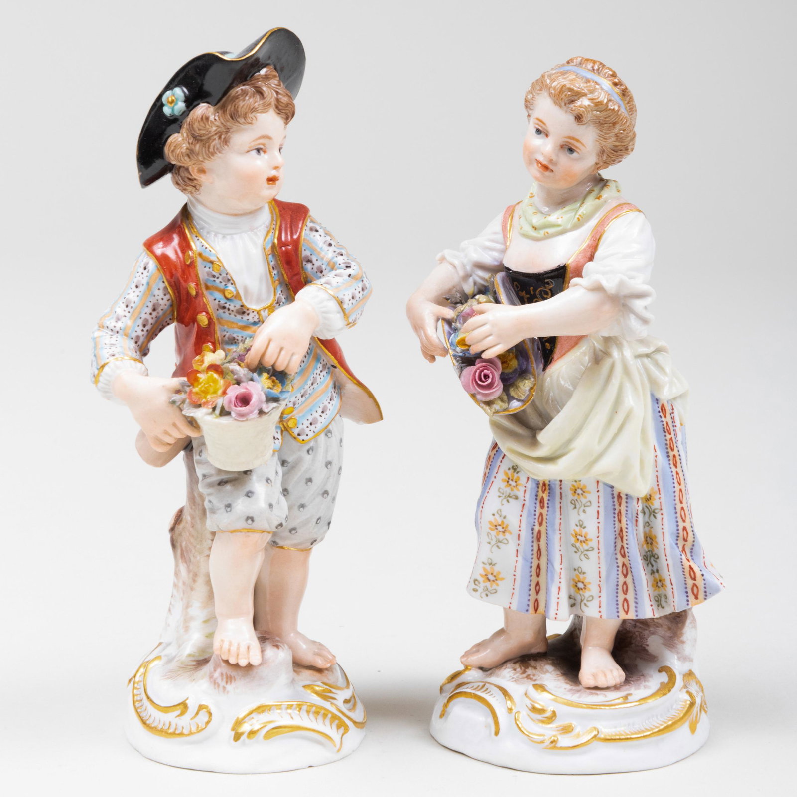 Pair of Meissen Porcelain Figures of Child Flower: Pair of Meissen Porcelain Figures of Child Flower Sellers Blue printed mark. The larger 5 1/4 in. high. Property from the Estate of Audrey Zauderer