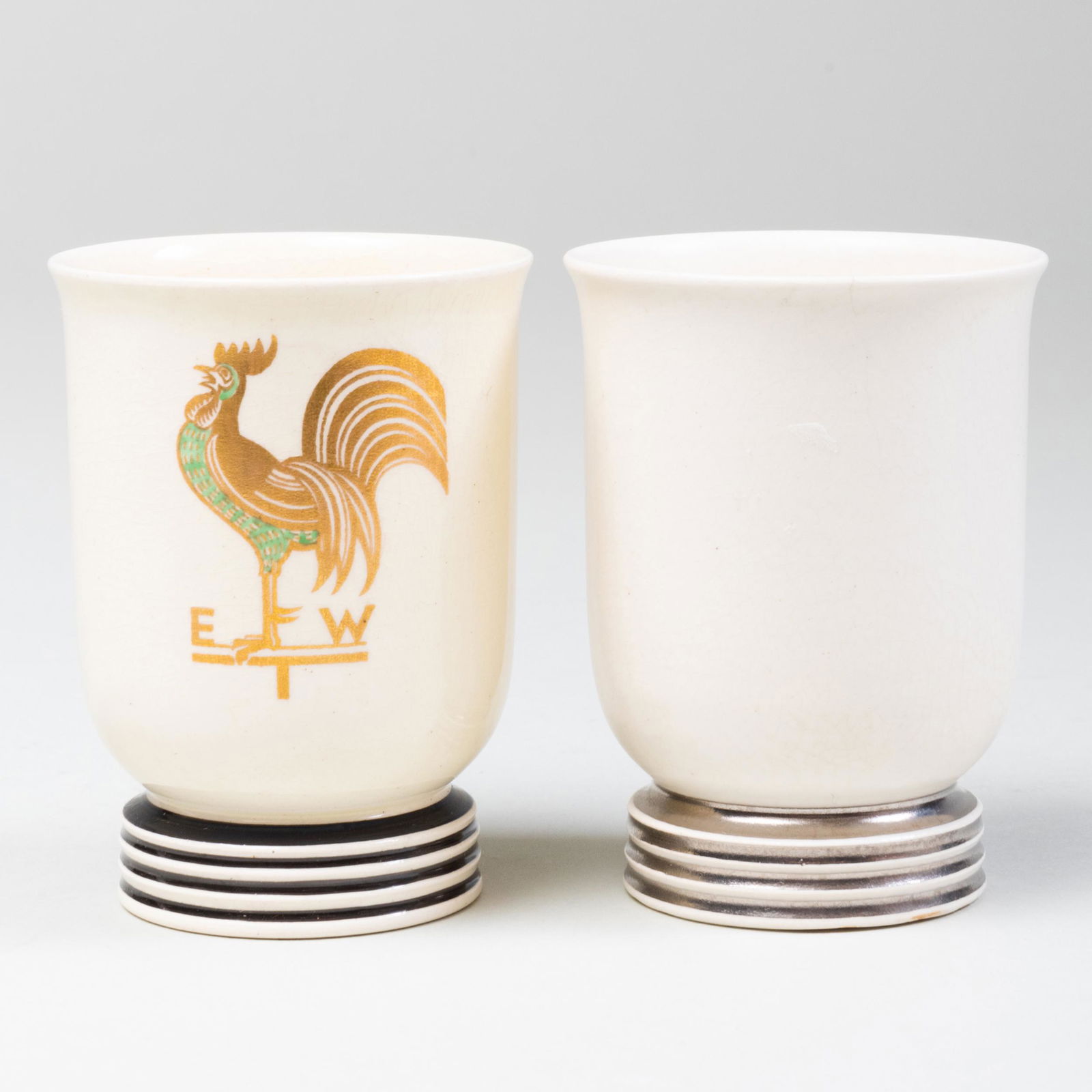 Two Keith Murray for Wedgwood Porcelain Demitasse Cups: Two Keith Murray for Wedgwood Porcelain Demitasse Cups Black printed marks. 2 3/4 x 2 1/8 in. diam. Applied labels for the Earl Buckman Collection no. 4175 and no. 3547. Property from the Collection o
