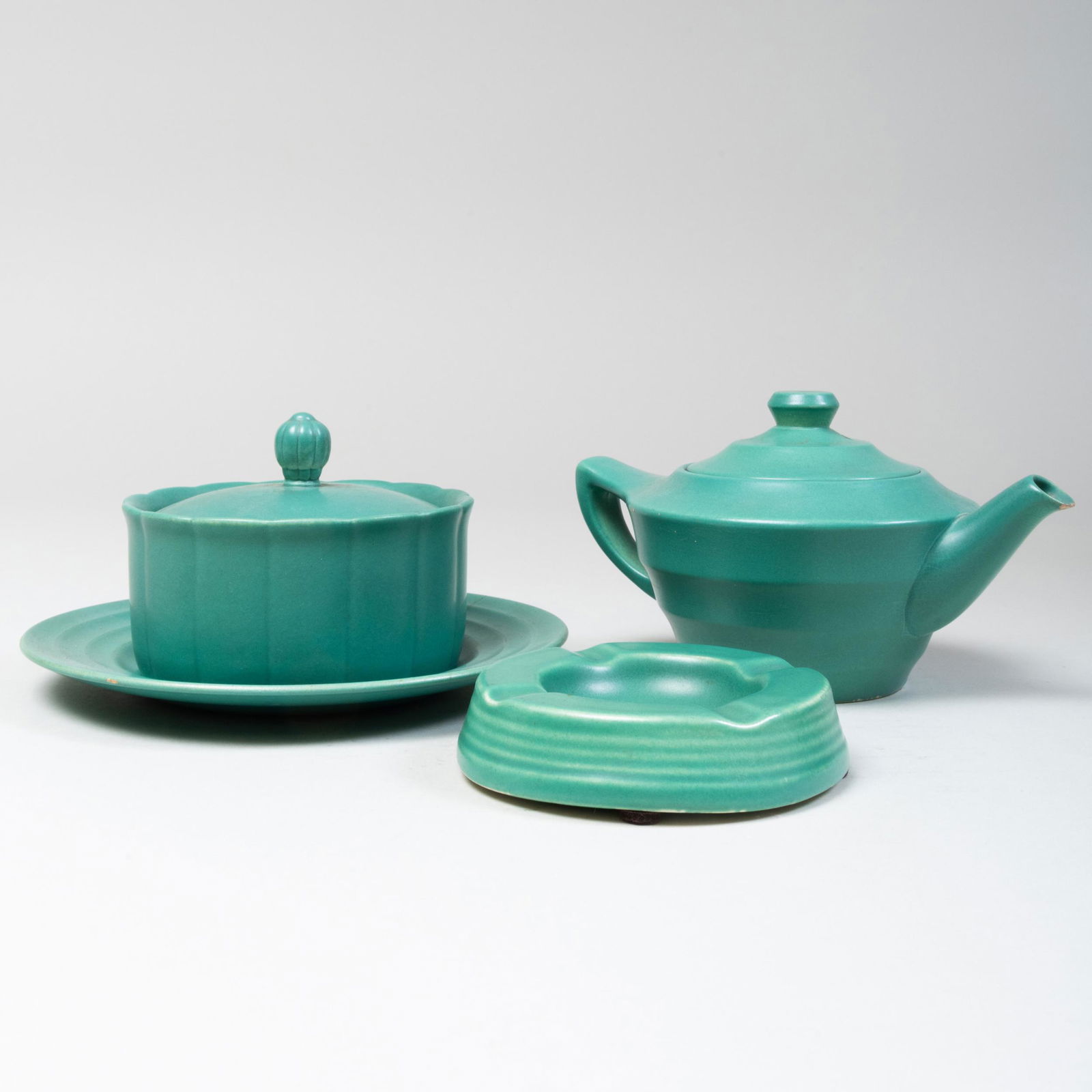 Keith Murray for Wedgwood Glazed Porcelain Breakfast: Keith Murray for Wedgwood Glazed Porcelain Breakfast Set Black printed mark. Comprising: A small teapot and cover A sugar bowl and cover A plate An ashtray The teapot 4 x 7 1/2 x 4 3/4 in. </p