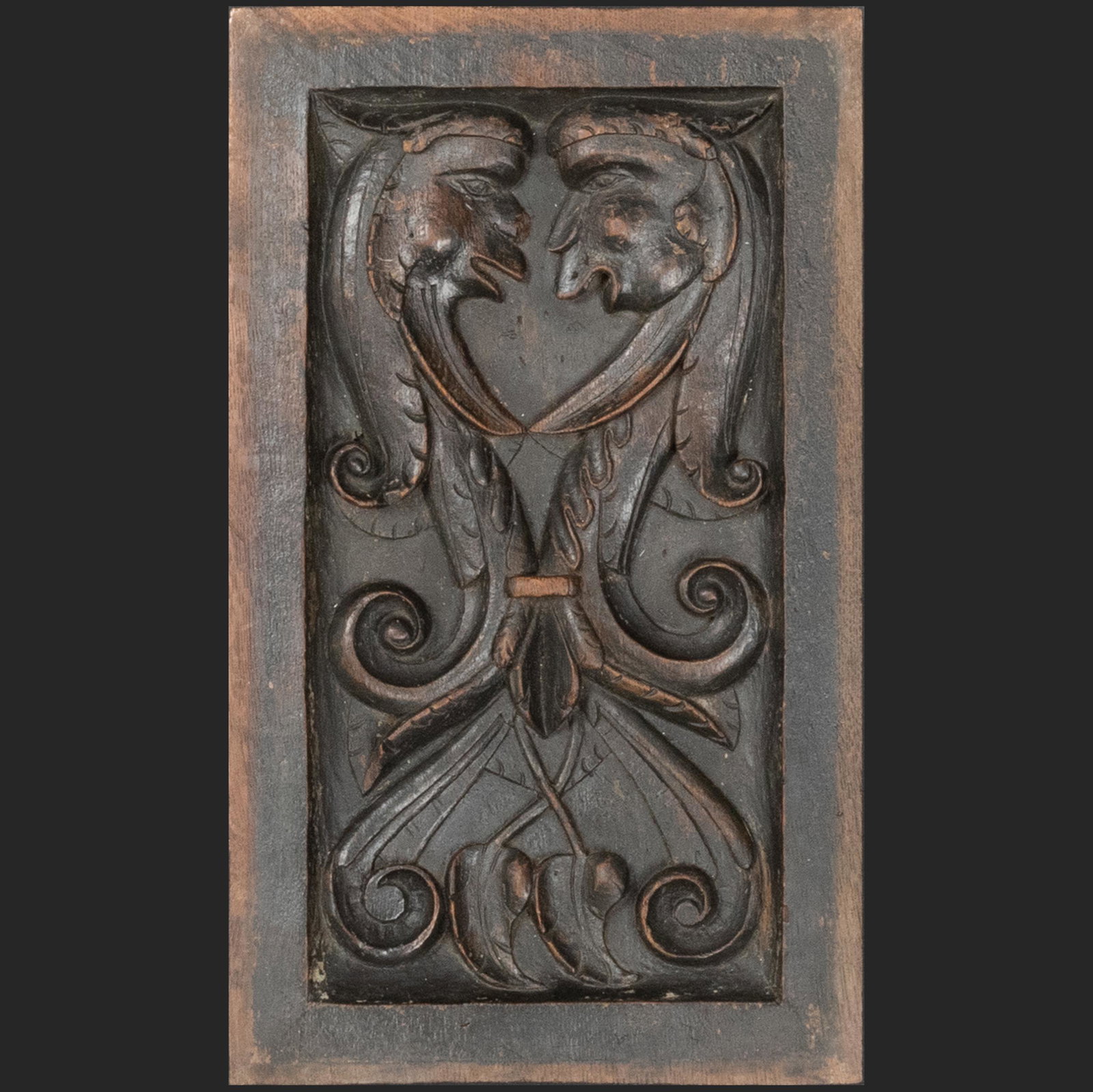 Three Anglo-French Gothic Carved Oak Panels: Three Anglo-French Gothic Carved Oak Panels Comprising: A Pair with 'Romayne' Portraits One with Paired Beasts One with Gothic Tracery 19 3/4 x 14 in., the largest. European Works of Art from the Coll