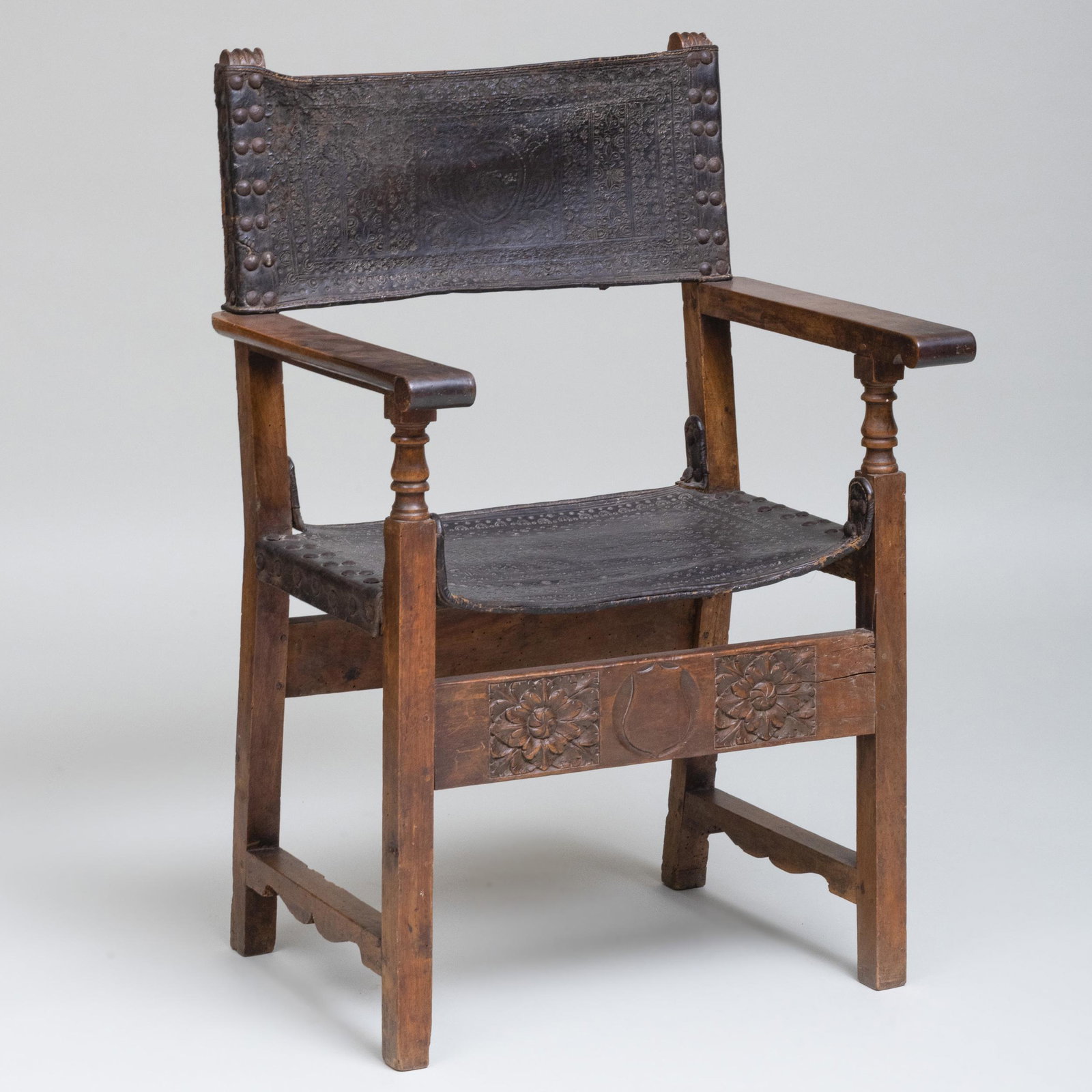Iberian Carved Walnut and Embossed Leather Armchair (1 of 12)