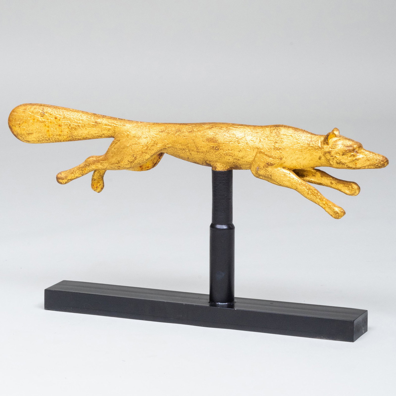 Gilt-Metal Fox Weathervane Raised on a stand. 14 x: Raised on a stand. 14 x 27 1/4 in. (overall).