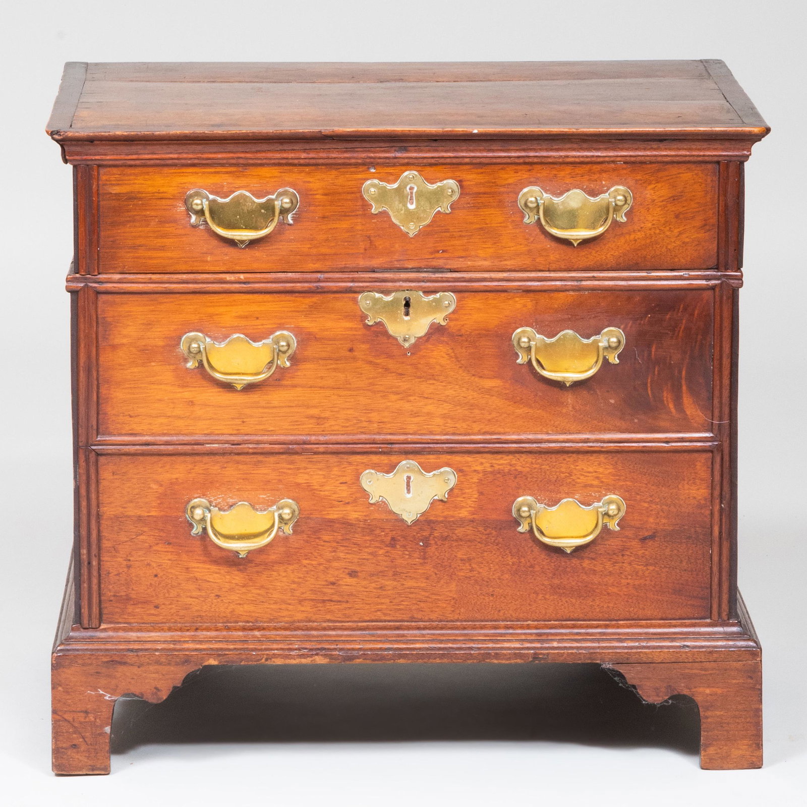 Chippendale Mahogany Cellarette in the form of a: With compartments for twelve bottles. 19 1/2 x 21 1/2 x 15 3/4 in.