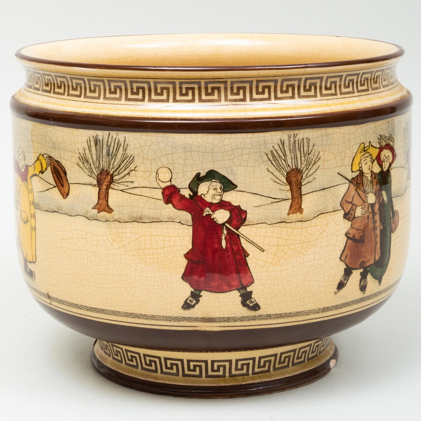 Royal Doulton Earthenware Jardinière with Figural: Royal Doulton Earthenware Jardinière with Figural Decoration Black printed mark. 10 1/2 x 12 in. diam. Private Collection, Johnstown, New York