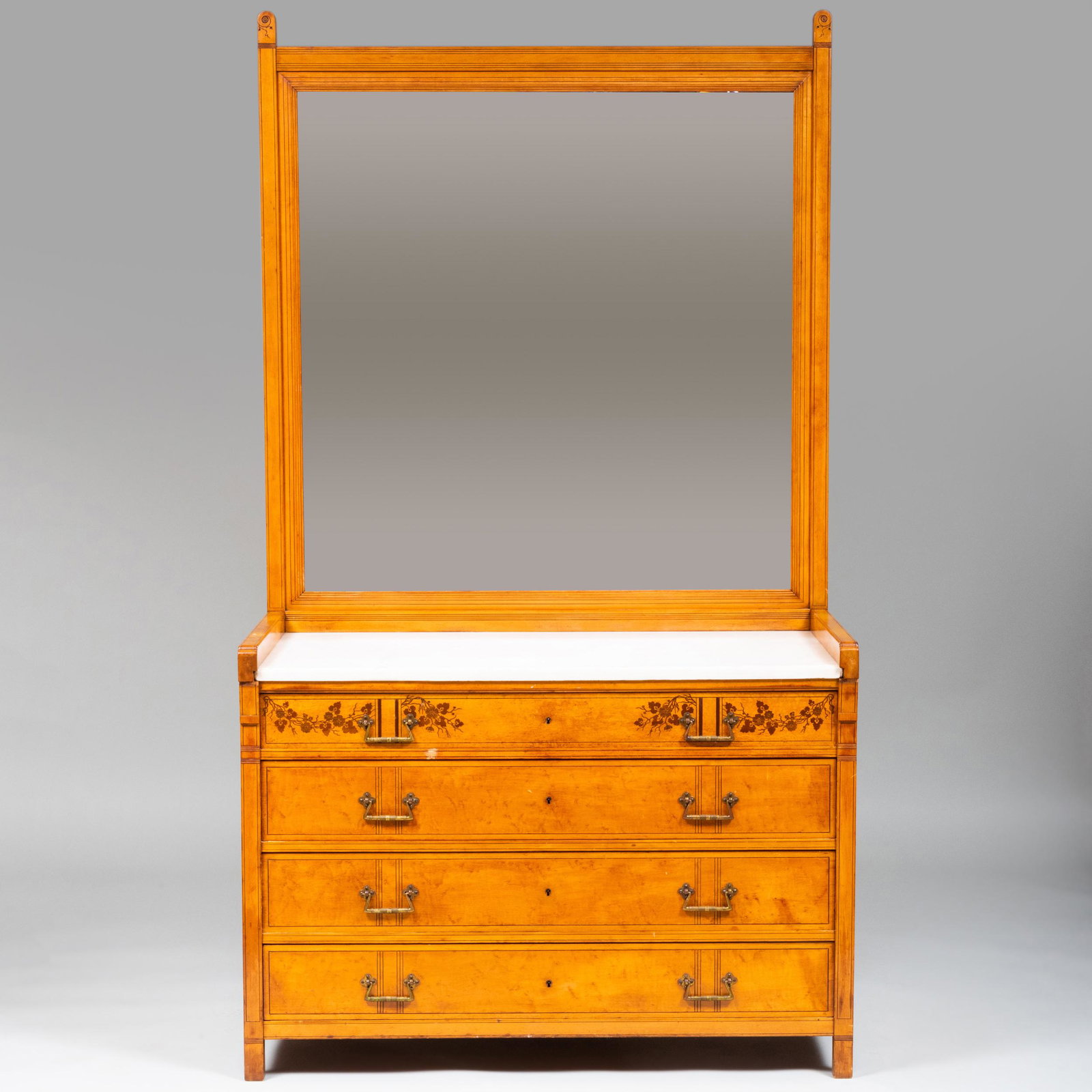Aesthetic Movement Inlaid Maple Mirror and Chest of: Aesthetic Movement Inlaid Maple Mirror and Chest of Drawers, Stamped Herter Brothers In two parts; fitted with a white marble top over four drawers, and inlaid with cherry blossoms. 6 ft. 9 in. x 45 1